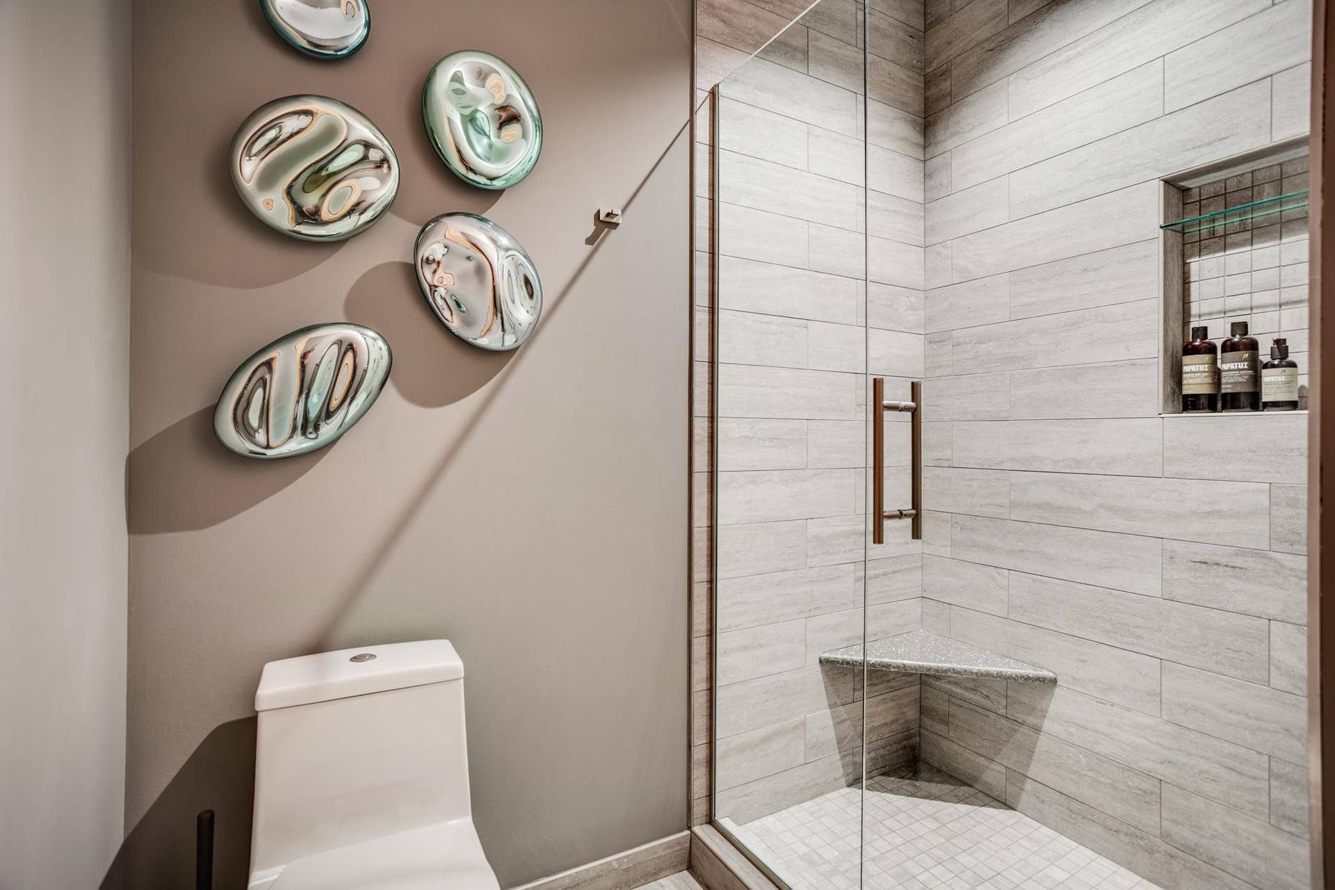 600 S 2nd Street, #S108, 18, Minneapolis, MN 55401 The designer bathroom is conveniently situated near the second bedroom.