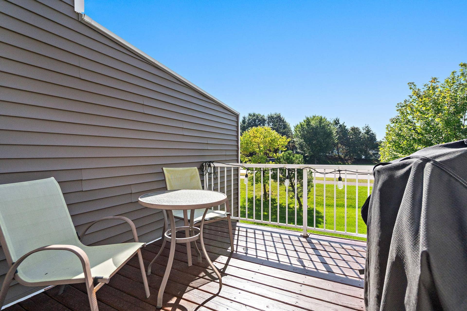 17549 70th Place N, Maple Grove, MN 55311 Super quaint private deck with party lights!