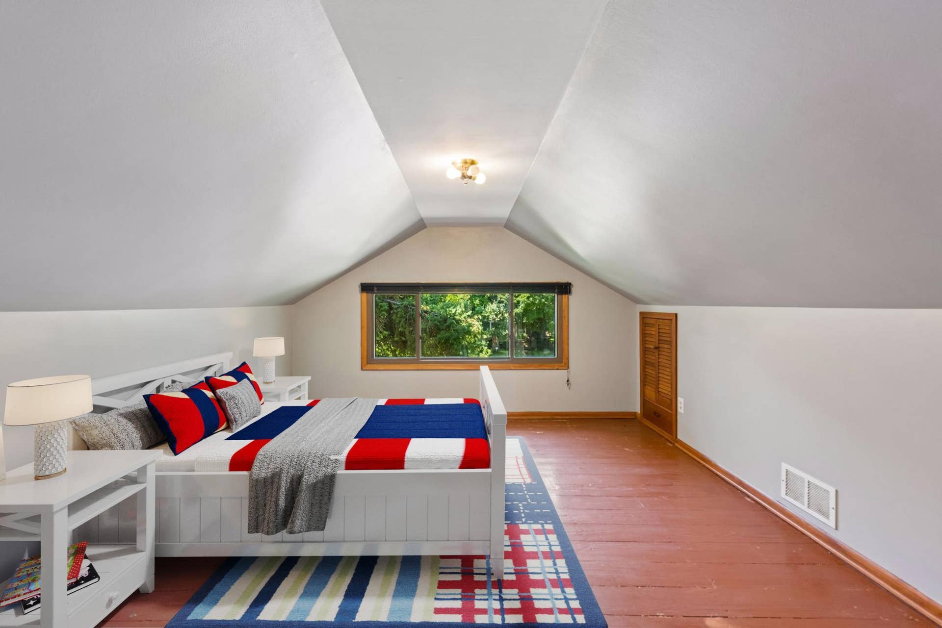 4615 Portland Avenue, 26, Minneapolis, MN 55407 The upper level offers a generous primary bedroom with a half bathroom (virtually staged).