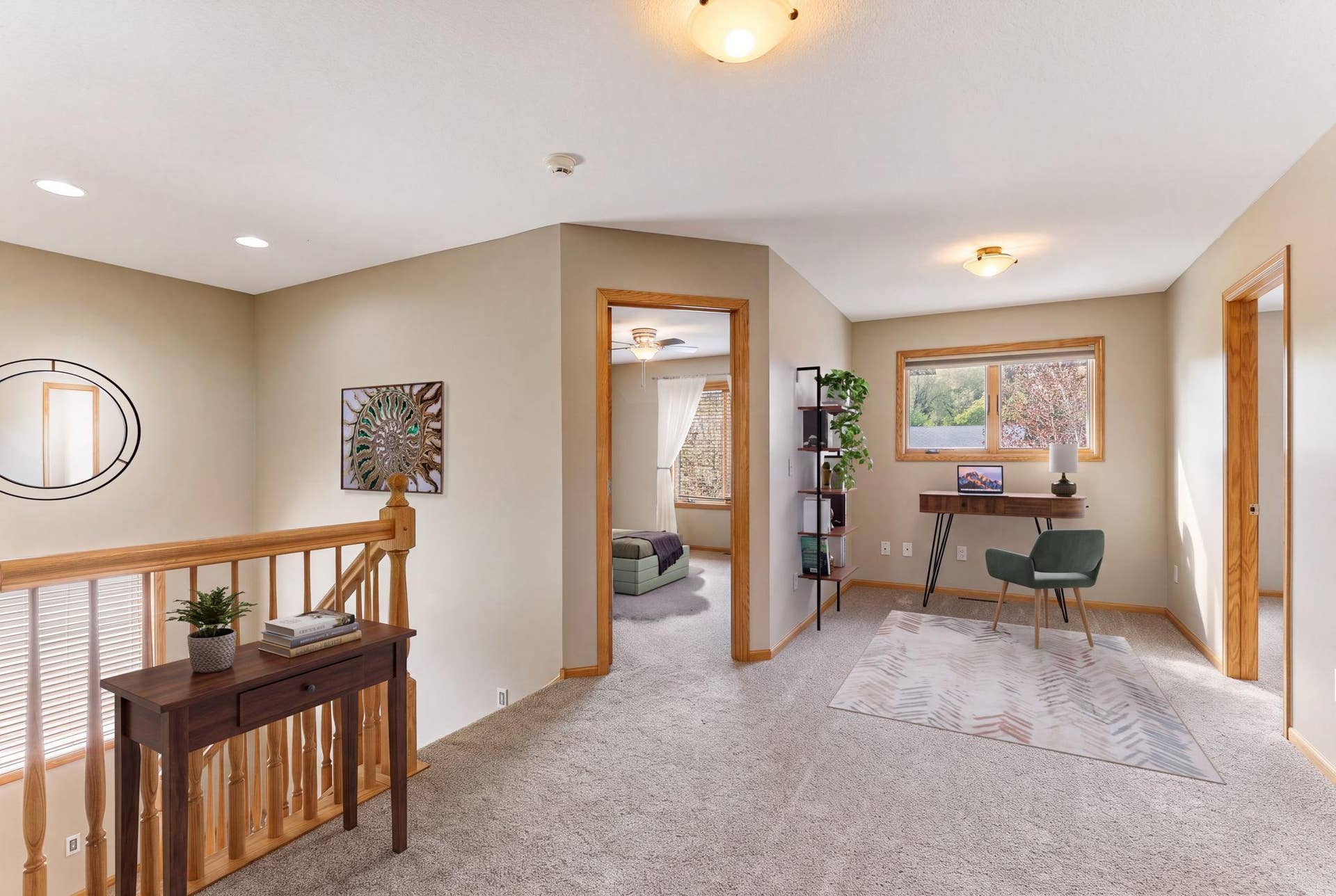 10360 Quail Avenue N, Brooklyn Park, MN 55443 This photo of the upstairs loft space is virtually staged.