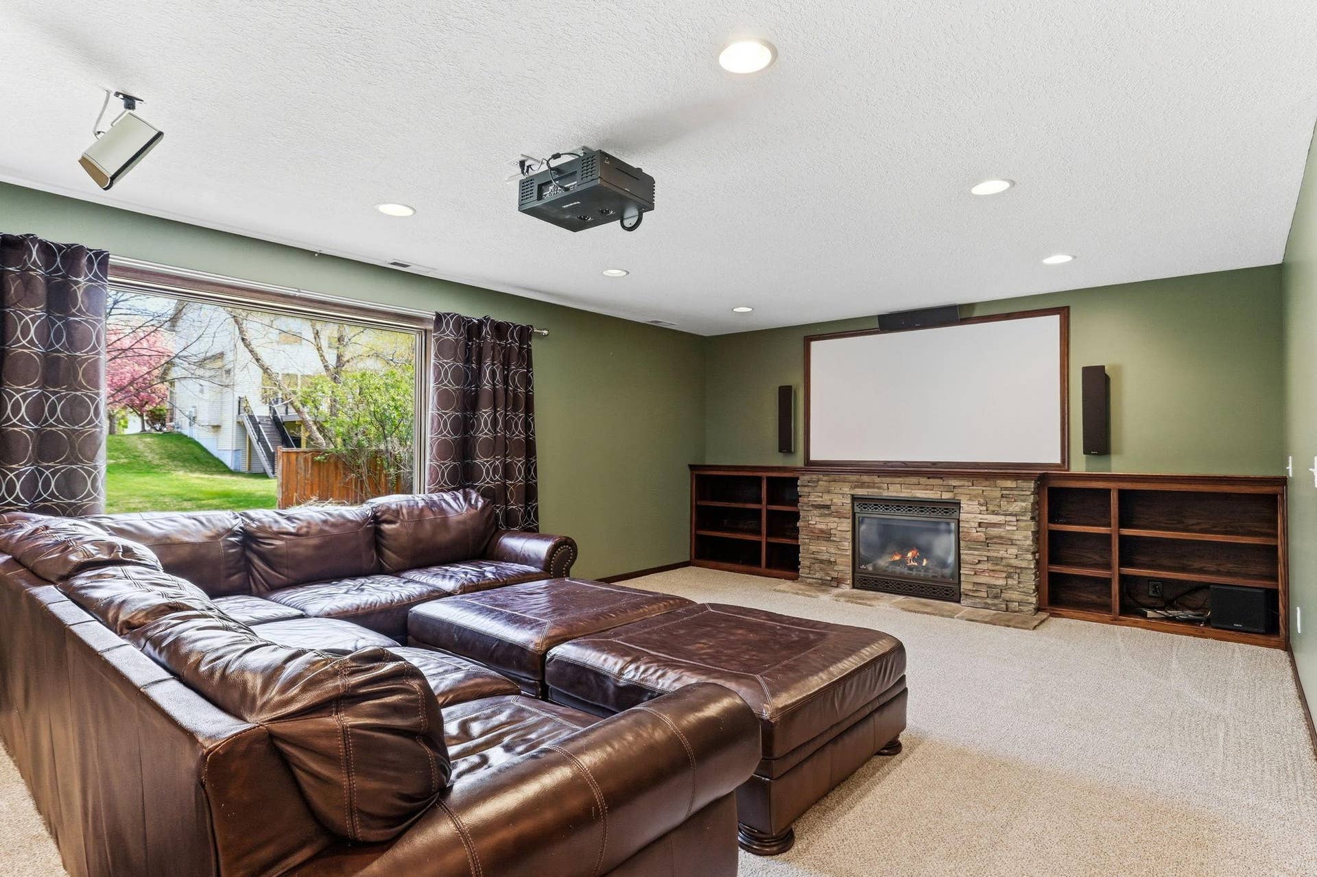 10360 Quail Avenue N, Brooklyn Park, MN 55443 Large basement with theater system.