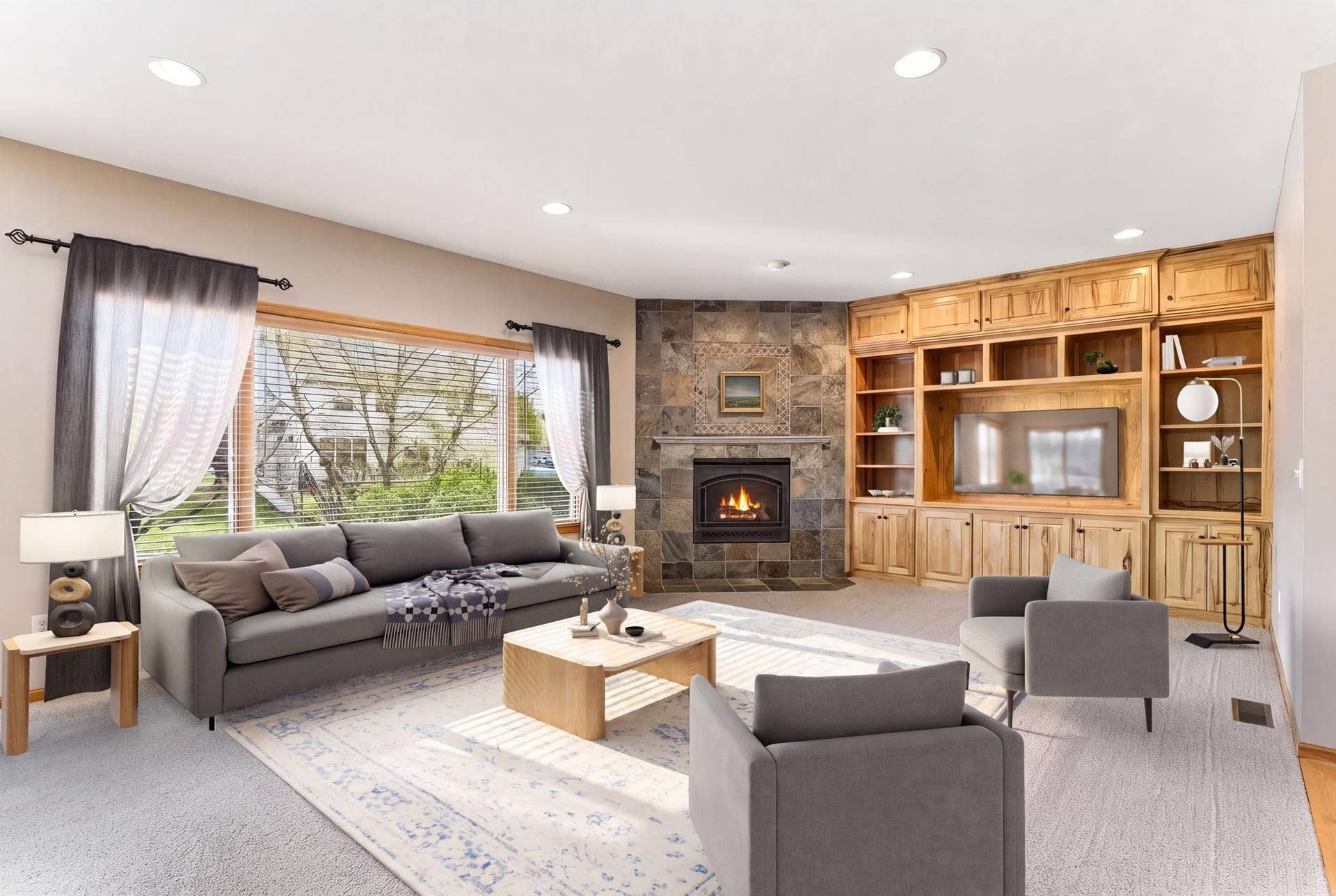 10360 Quail Avenue N, Brooklyn Park, MN 55443 This photo of the main floor living room is virtually staged