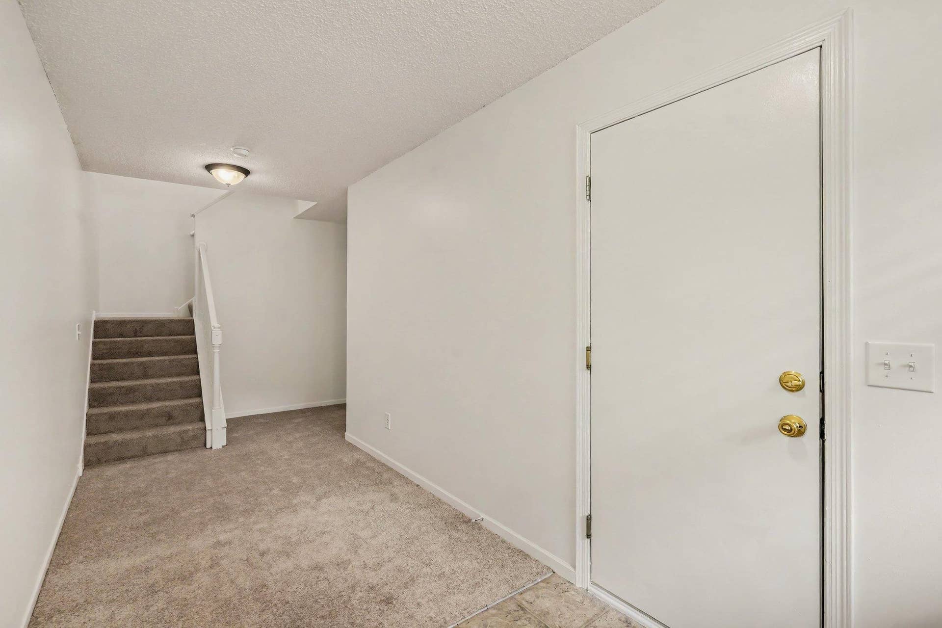 697 Kingfisher Lane, #H, Woodbury, MN 55125 Foyer to Laundry room and Garage