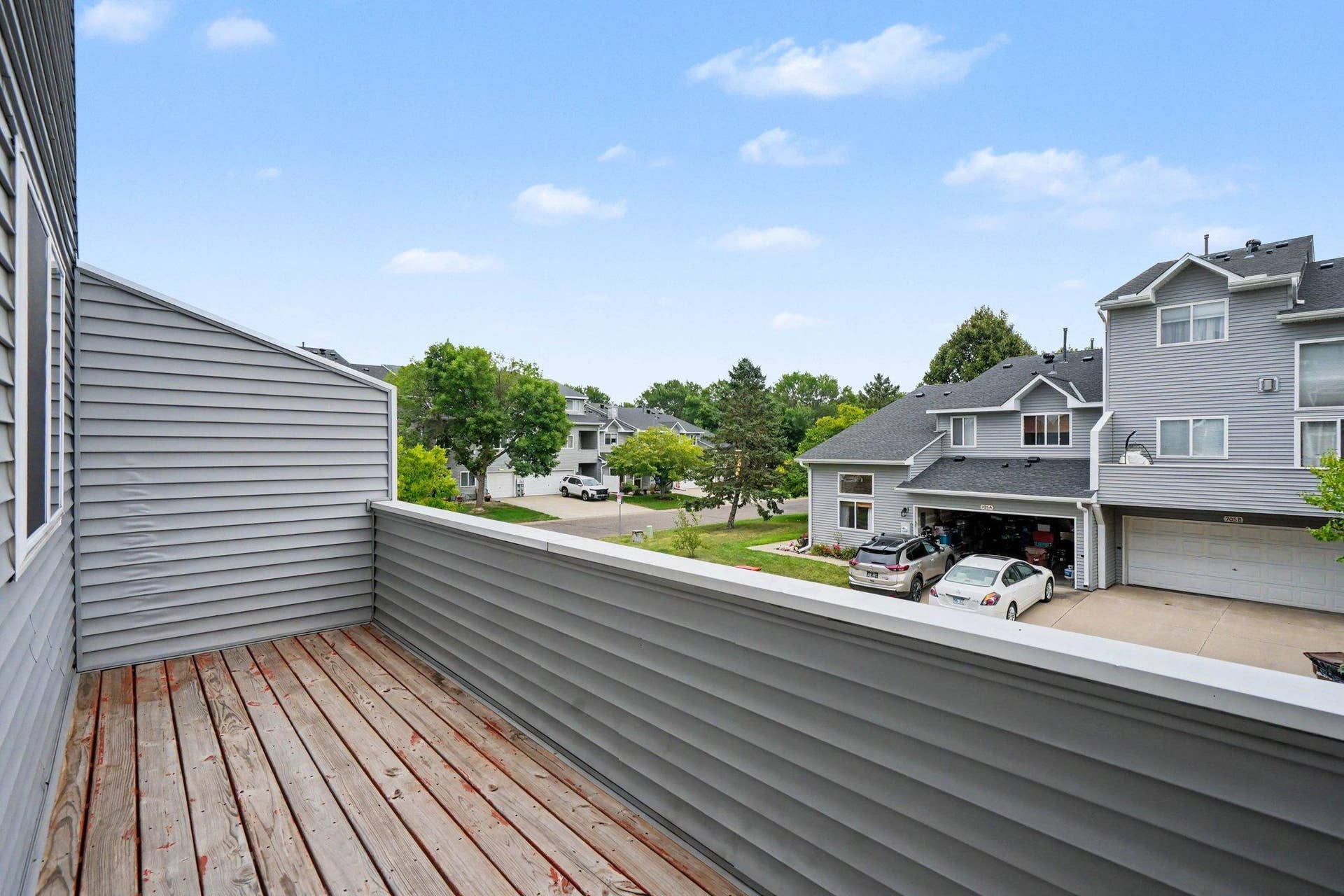 697 Kingfisher Lane, #H, Woodbury, MN 55125 Main Level Deck Views