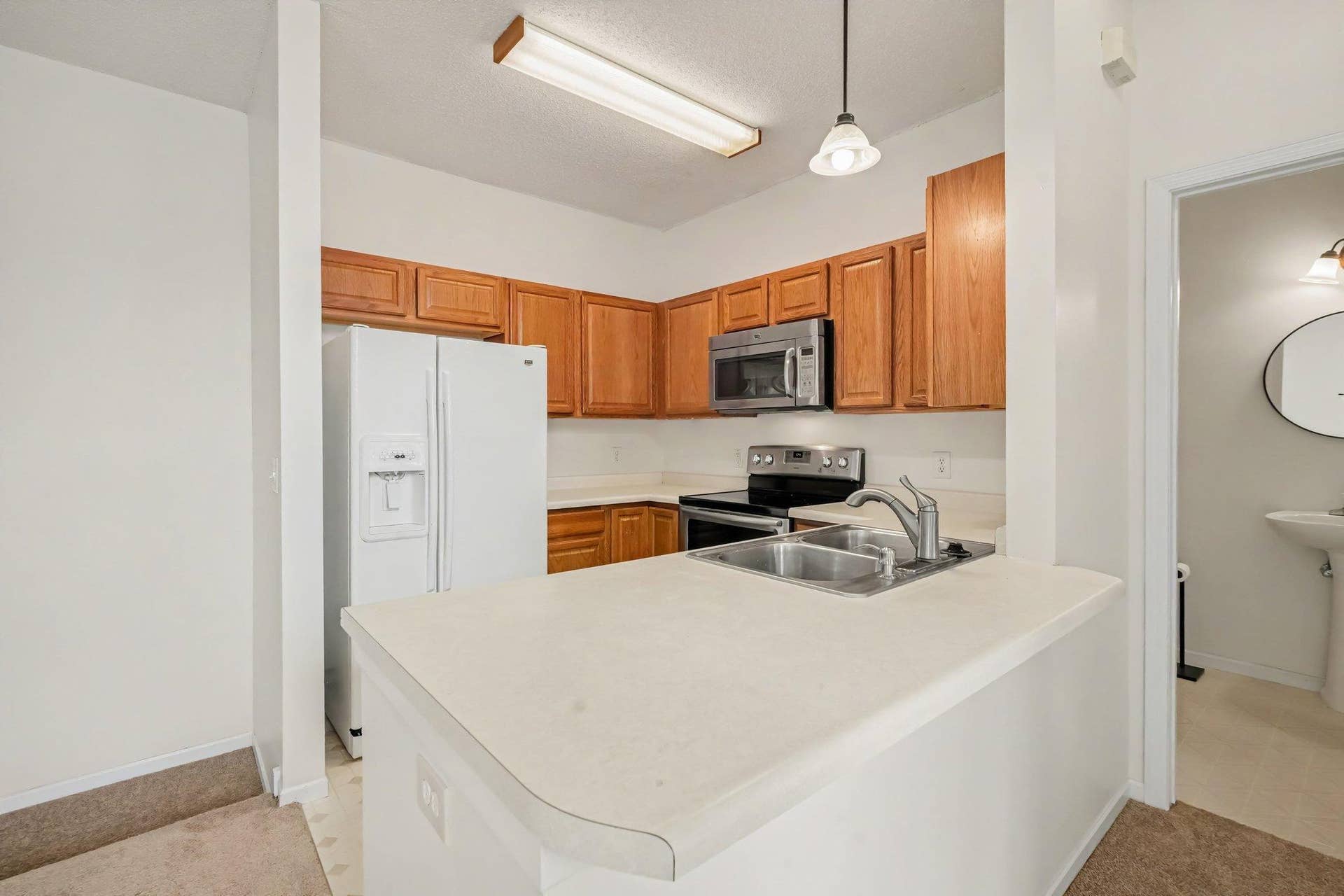 697 Kingfisher Lane, #H, Woodbury, MN 55125 Kitchen with updated Dishwasher Range and Micro