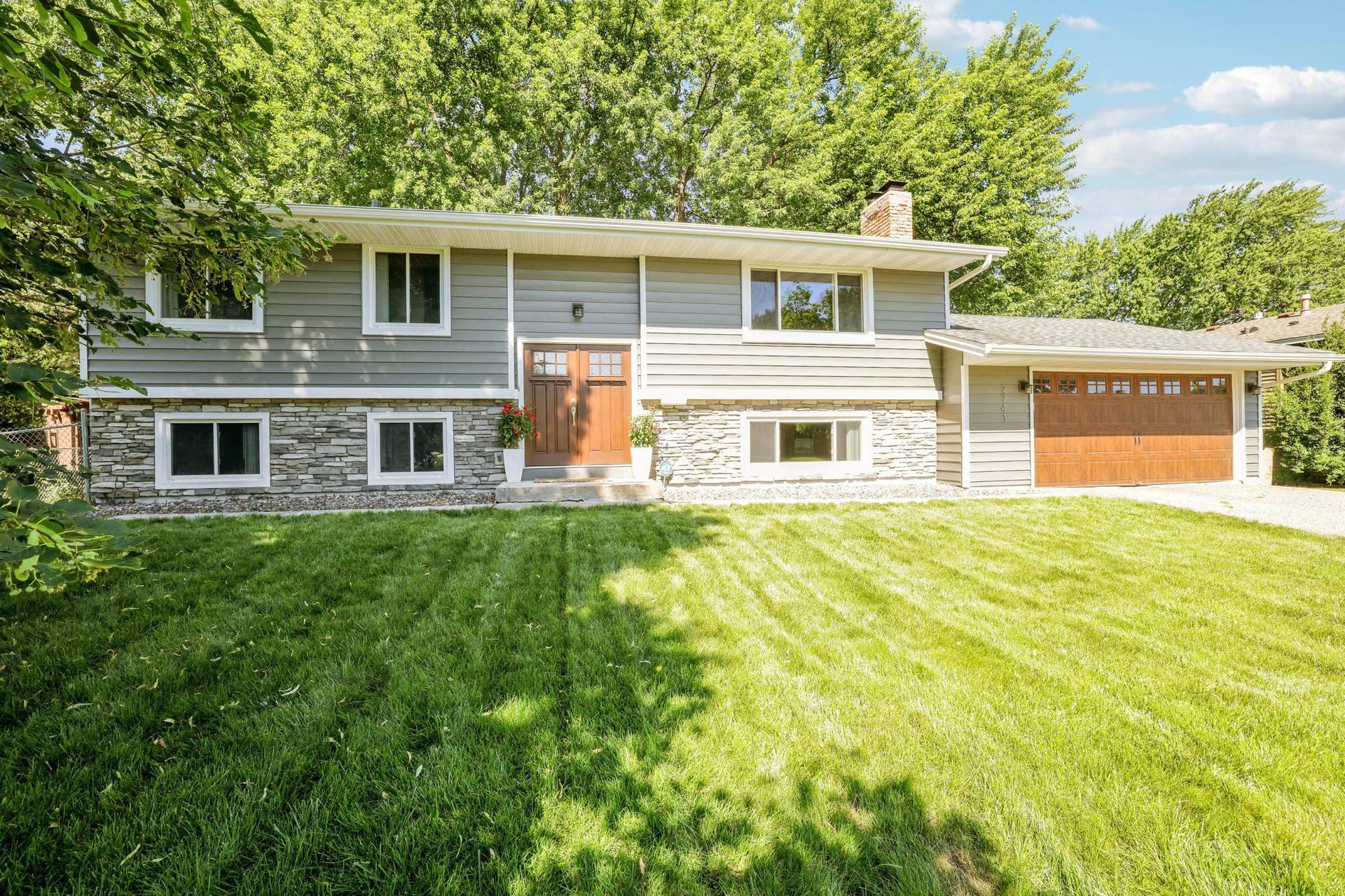 2741 Xylon Avenue N, New Hope, MN 55427 Easy maintenance with this beautiful steel siding, newer Garage & front doors