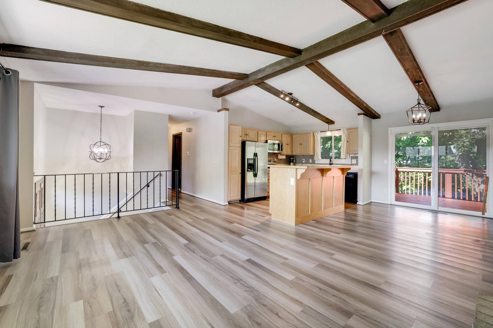 2741 Xylon Avenue N, New Hope, MN 55427 The open-concept floor plan features a refreshed kitchen with newer appliances that flows seamlessly into the dining and living areas, creating an ideal space for everyday living and entertaining.