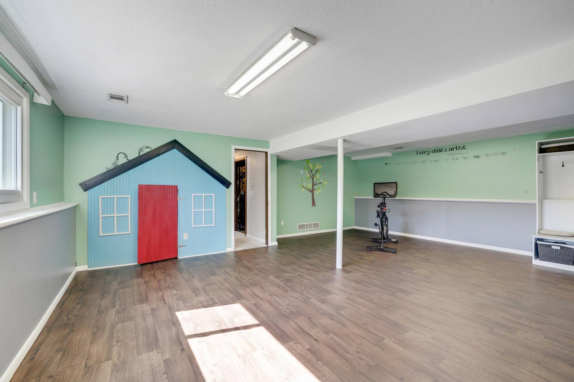 2741 Xylon Avenue N, New Hope, MN 55427 Look at that adorable play space! Under the stair storage currently used as a secret room play area, just behind that red door....