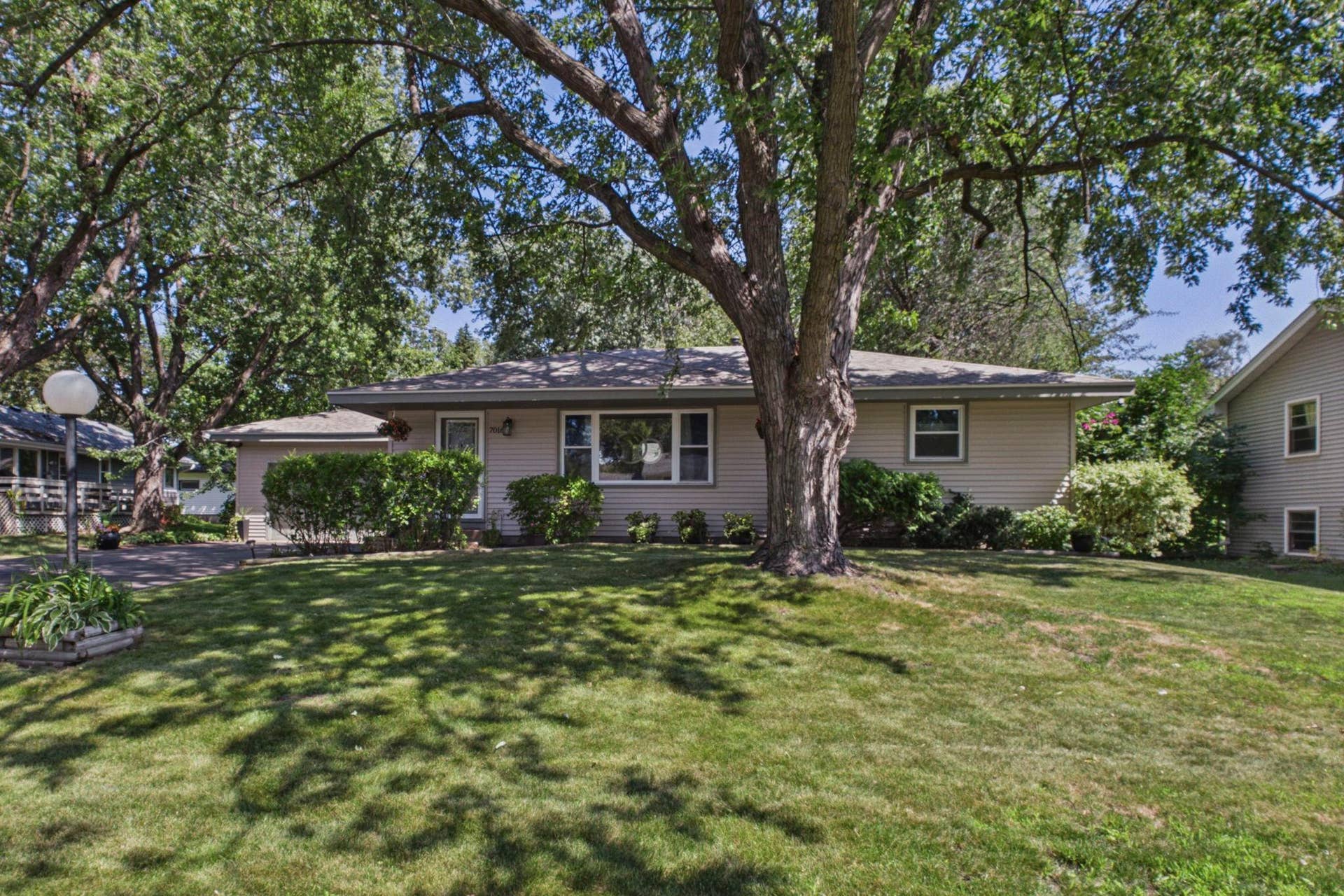 7016 Colorado Avenue N, Brooklyn Park, MN 55429 Great Rambler/Ranch with brand new roof, newer siding, newer windows, mature trees, newer driveway (extra wide), nicely landscaped.