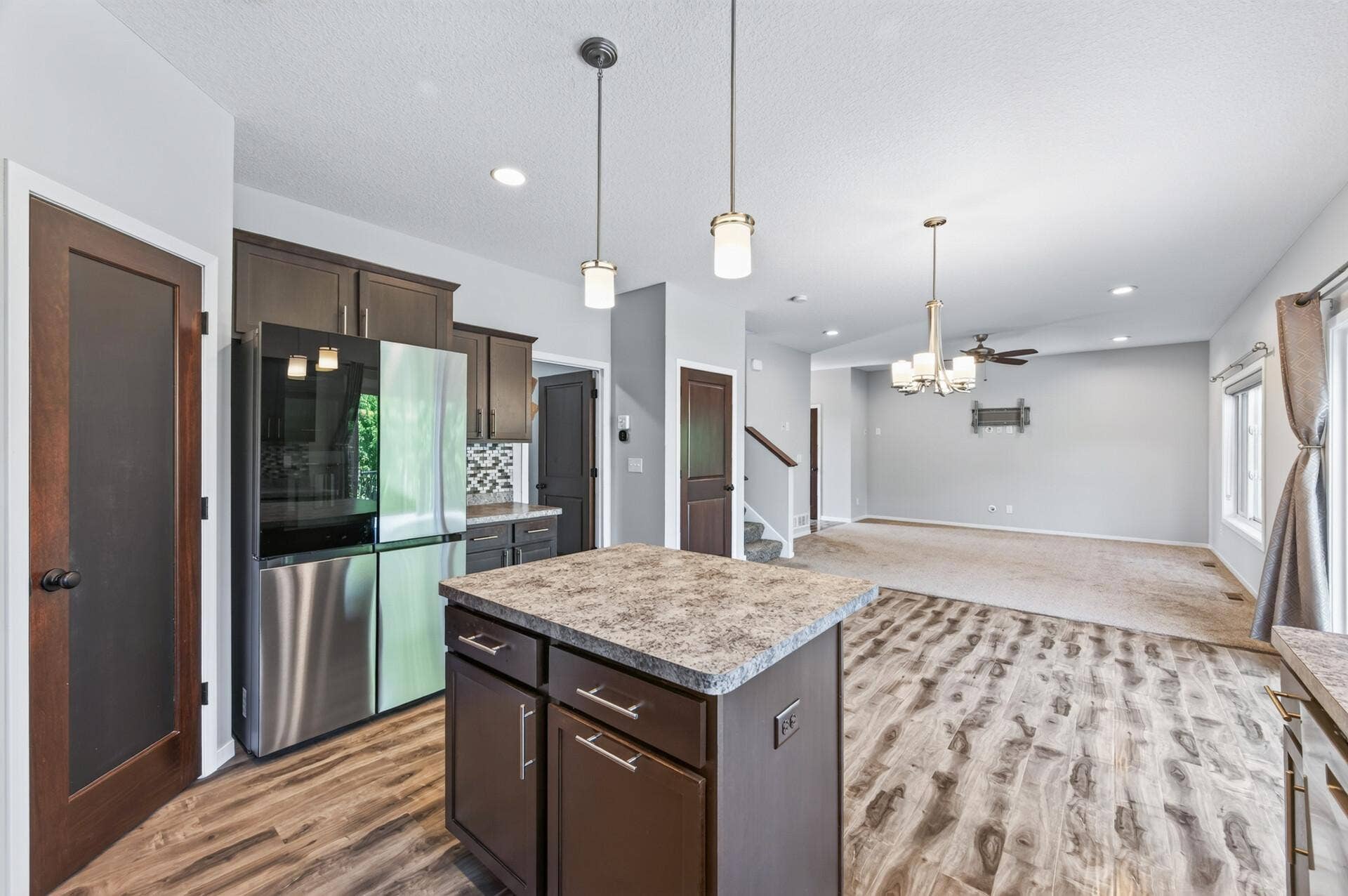 Main level kitchen, dining area and living room