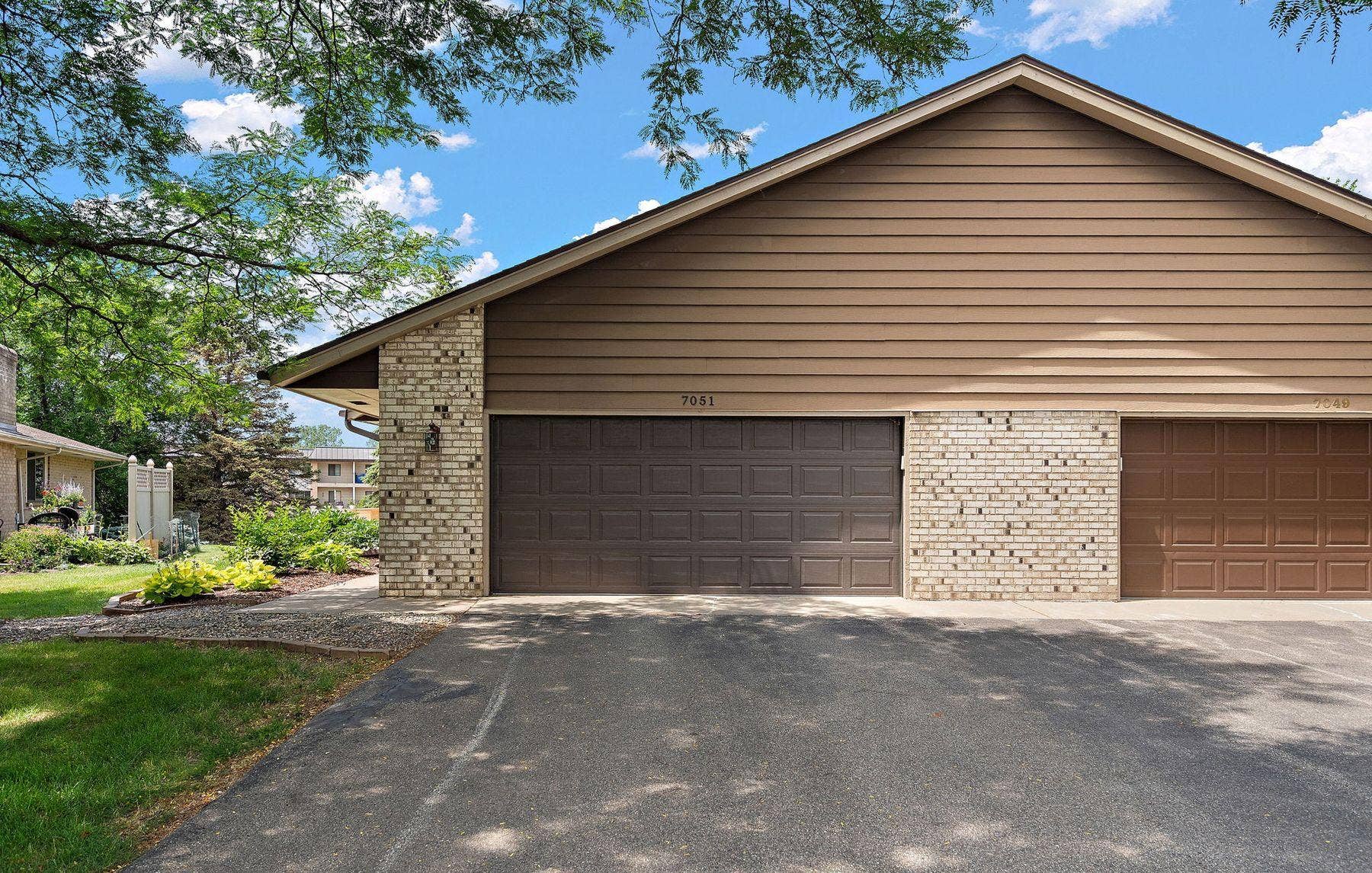 7051 Robinwood Trail, Woodbury, MN 55125 7051 Robinwood Trail, Woodbury, MN 55125