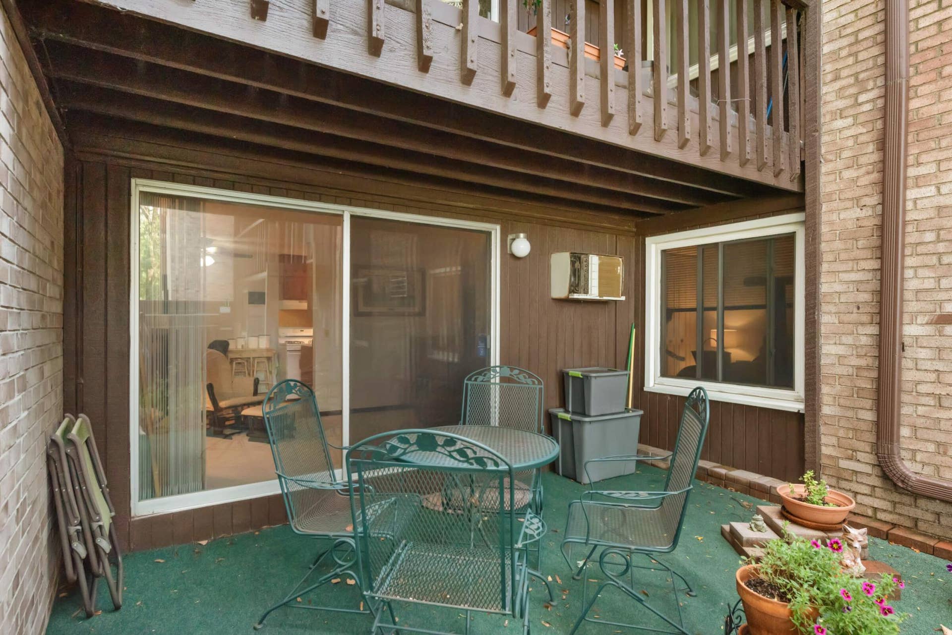 4201 Lakeside Avenue N, #113, Brooklyn Center, MN 55429 The shaded patio provides a comfortable outdoor retreatperfect for morning coffee or relaxing at the end of the day.