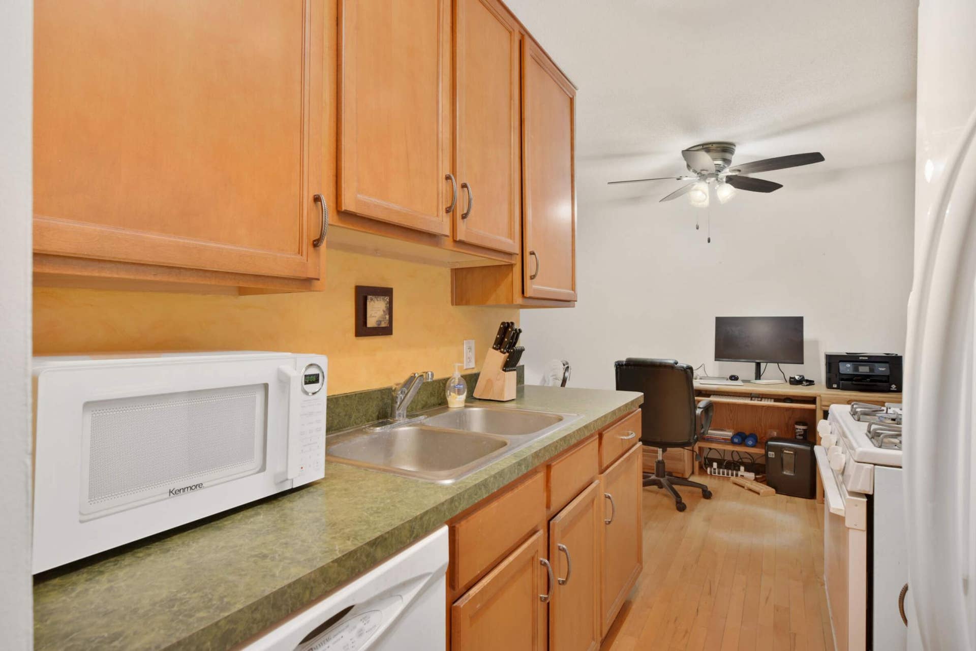 4201 Lakeside Avenue N, #113, Brooklyn Center, MN 55429 The functional kitchen includes a gas range, ample workspace, and plenty of storage to keep everything organized.