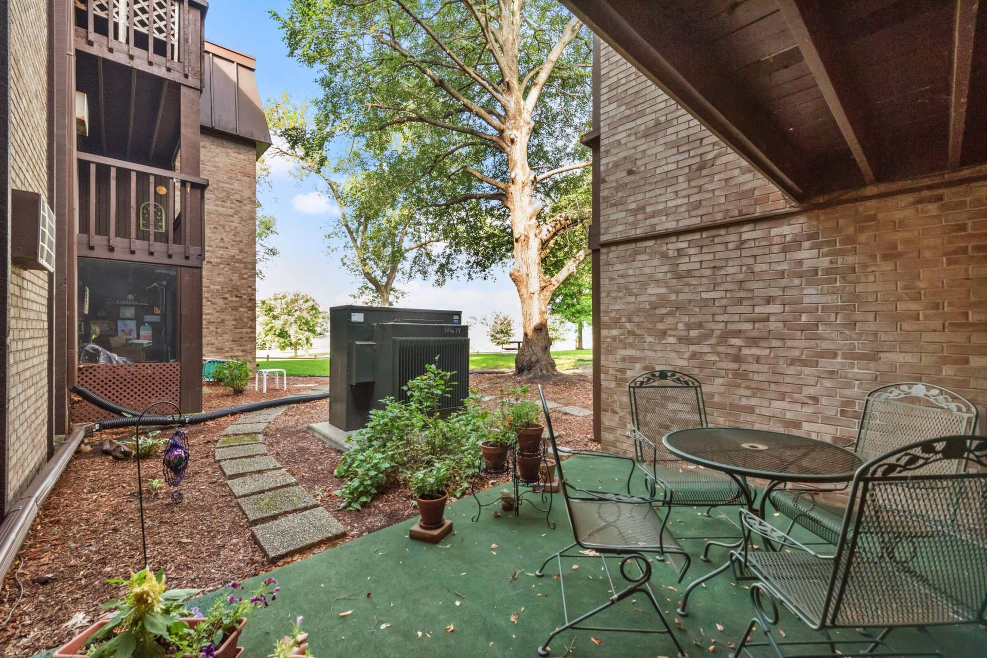 4201 Lakeside Avenue N, #113, Brooklyn Center, MN 55429 Enjoy peaceful views from your private ground-level patio with direct access to beautifully landscaped community green space.