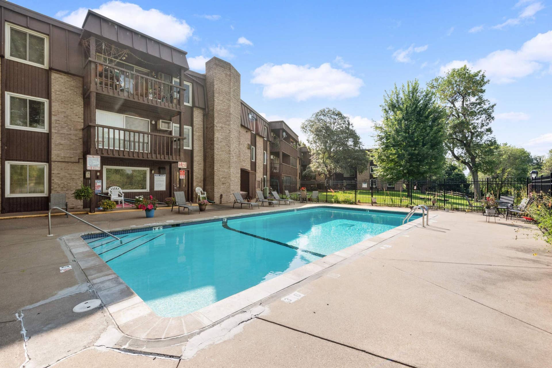 4201 Lakeside Avenue N, #113, Brooklyn Center, MN 55429 Resort-style outdoor pool offering a relaxing retreat just steps from your door.