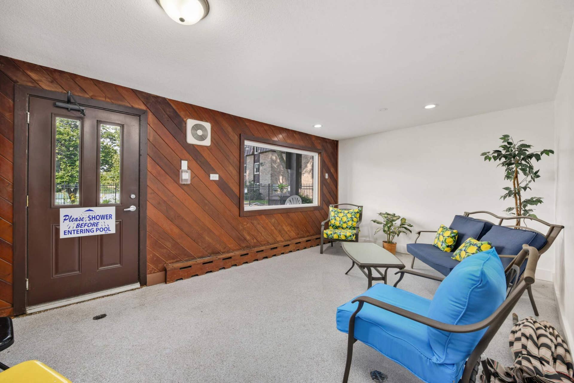 4201 Lakeside Avenue N, #113, Brooklyn Center, MN 55429 Relax in the beautifully maintained pool lounge, perfect for gathering with neighbors or unwinding after a swim.