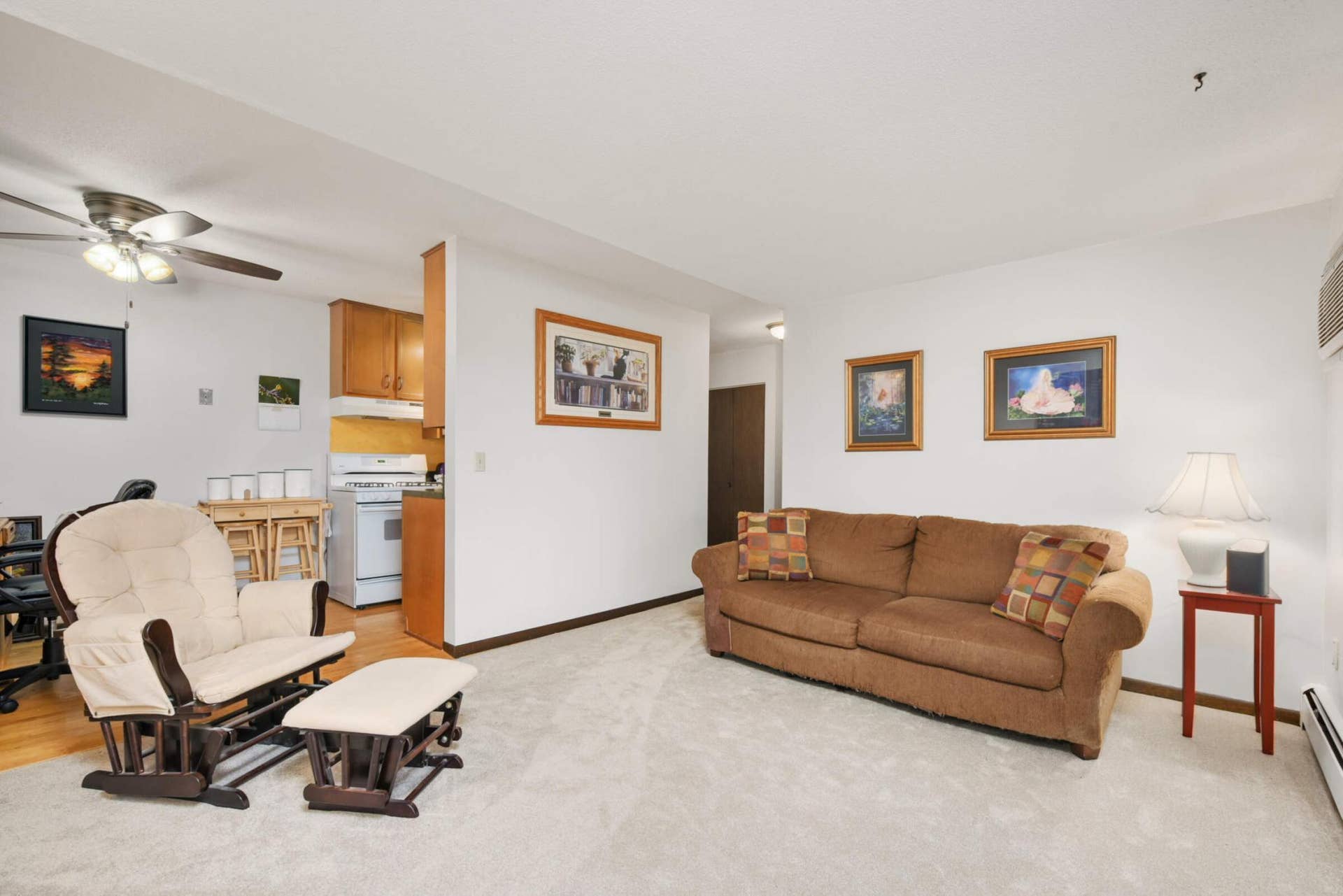 4201 Lakeside Avenue N, #113, Brooklyn Center, MN 55429 The open-concept living area flows seamlessly into the dining and kitchen spaces, creating an efficient and versatile layout.