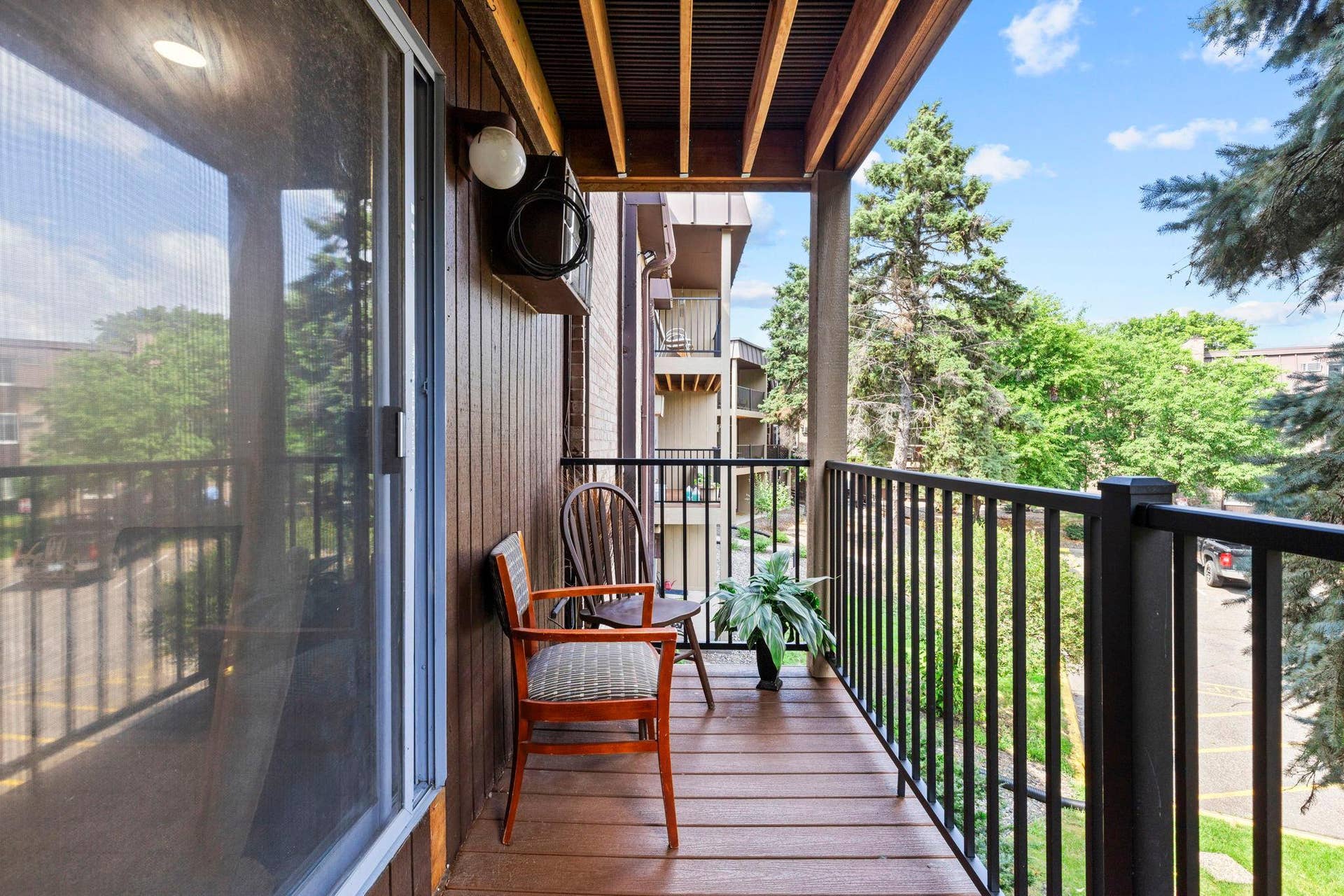 4201 Lakeside Avenue N, #214, Brooklyn Center, MN 55429 A look at the private balcony, the perfect spot to enjoy a morning cup of coffee and take in the peaceful surroundings.