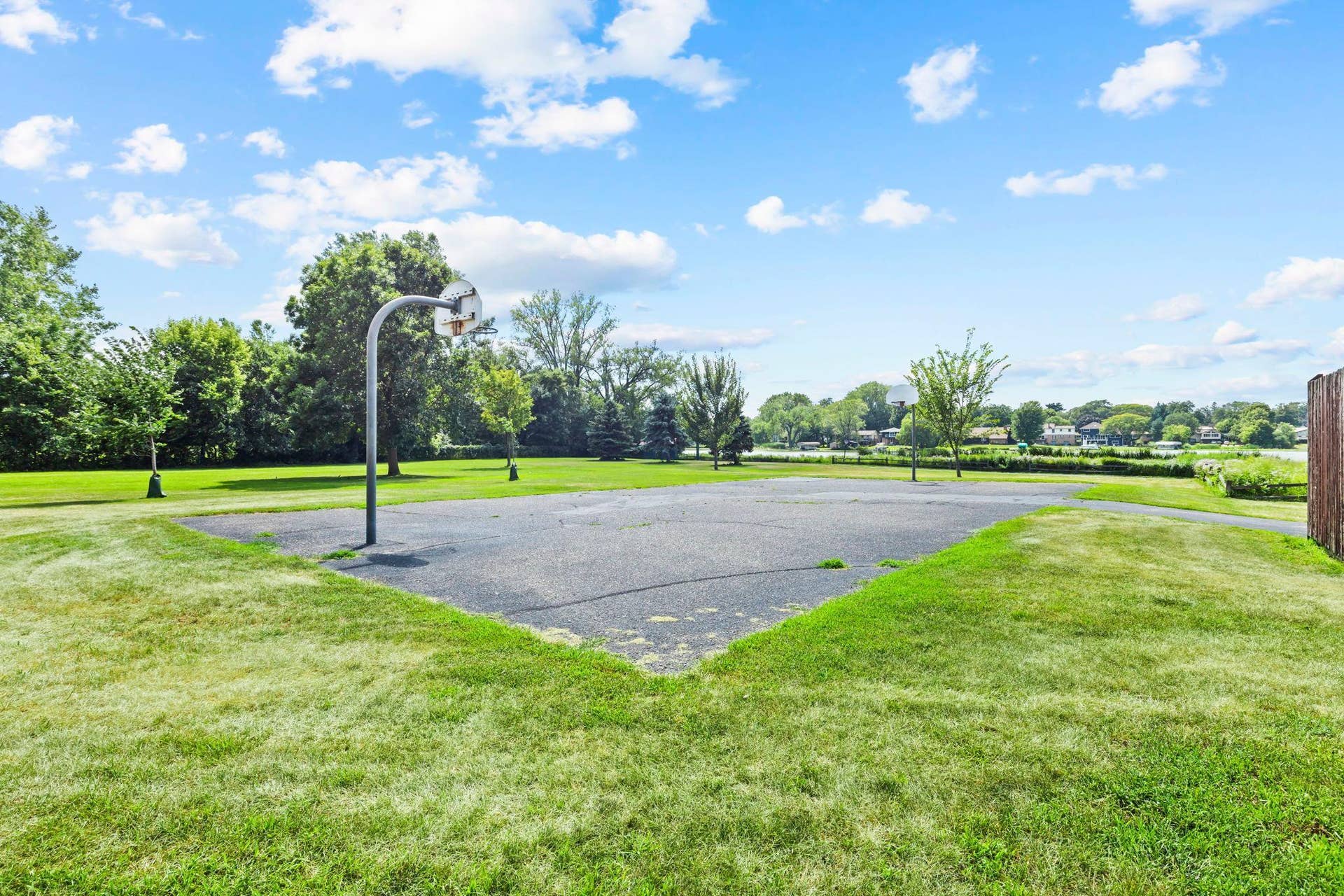 4201 Lakeside Avenue N, #214, Brooklyn Center, MN 55429 Enjoy the sport court, offering a great space for outdoor recreation and staying active.