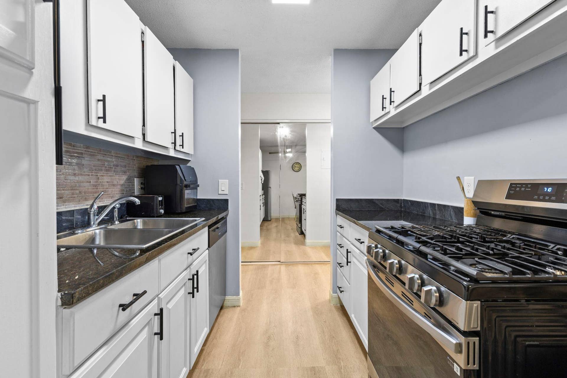 4201 Lakeside Avenue N, #214, Brooklyn Center, MN 55429 Step inside this well-maintained and thoughtfully updated home featuring luxury plank flooring that extends throughout the kitchen and dining areas.
