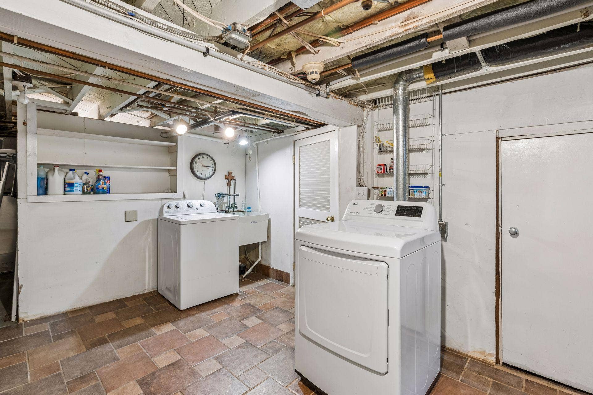 4120 Queen Avenue S, 42, Minneapolis, MN 55410 Dedicated laundry area with cabinetry, utility sink, and full-size appliances.