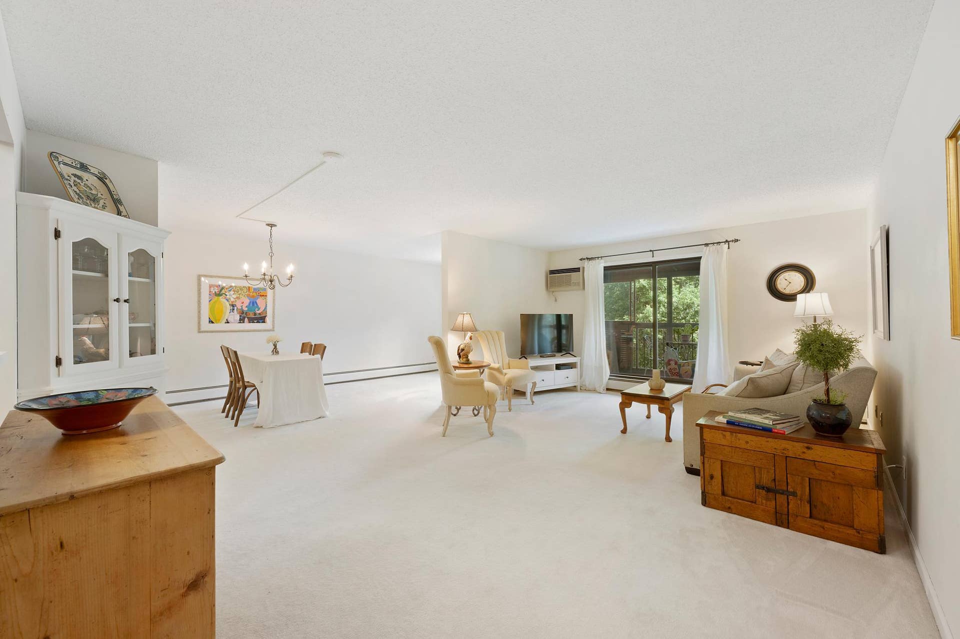 1800 Riverwood Drive, #301, Burnsville, MN 55337 Open floor plan and move-in ready. Note the porch directly off the living room.