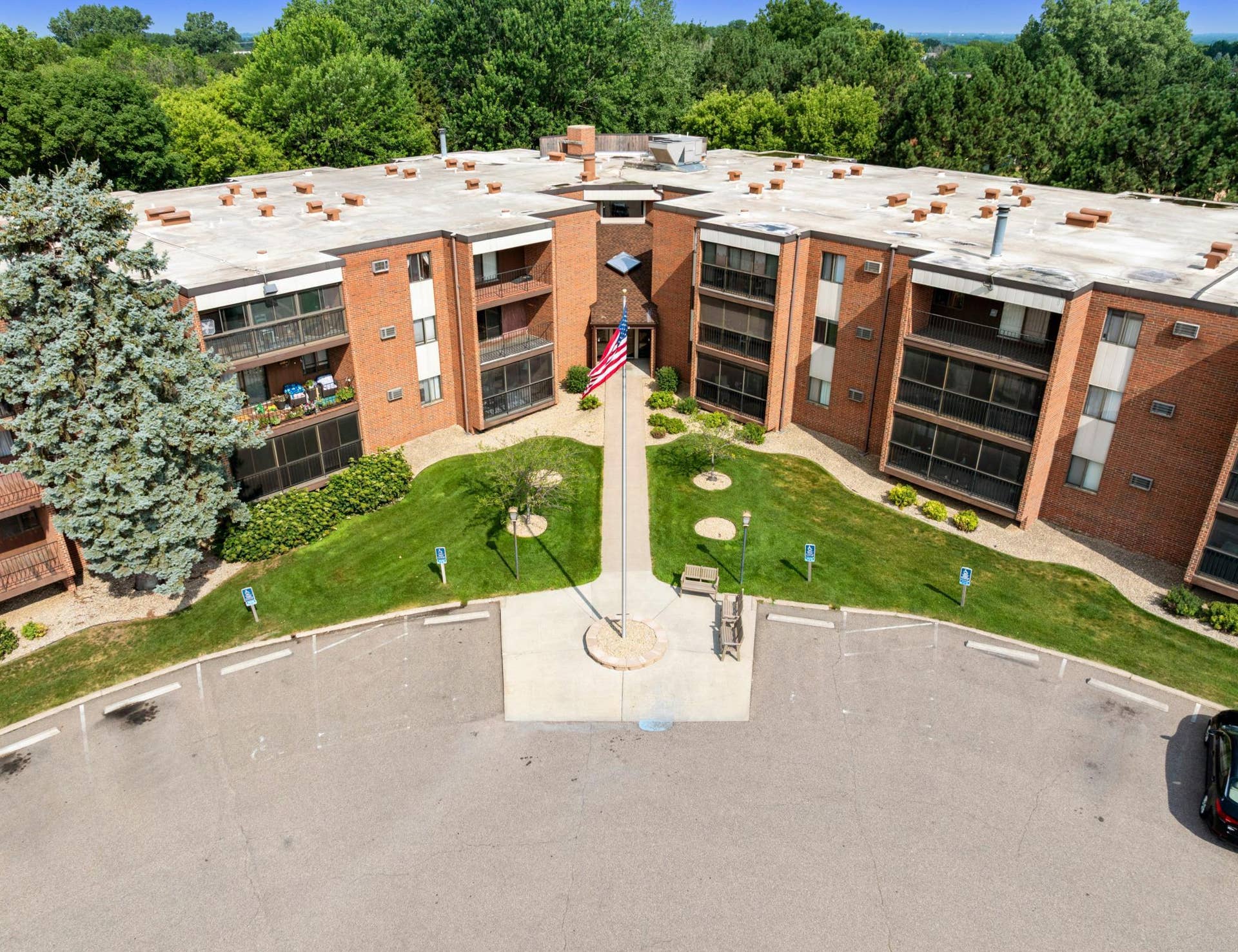 1800 Riverwood Drive, #301, Burnsville, MN 55337 This spacious development, surrounded by mature trees and greenery, was thoughfully designed and built strictly for condominium purposes.