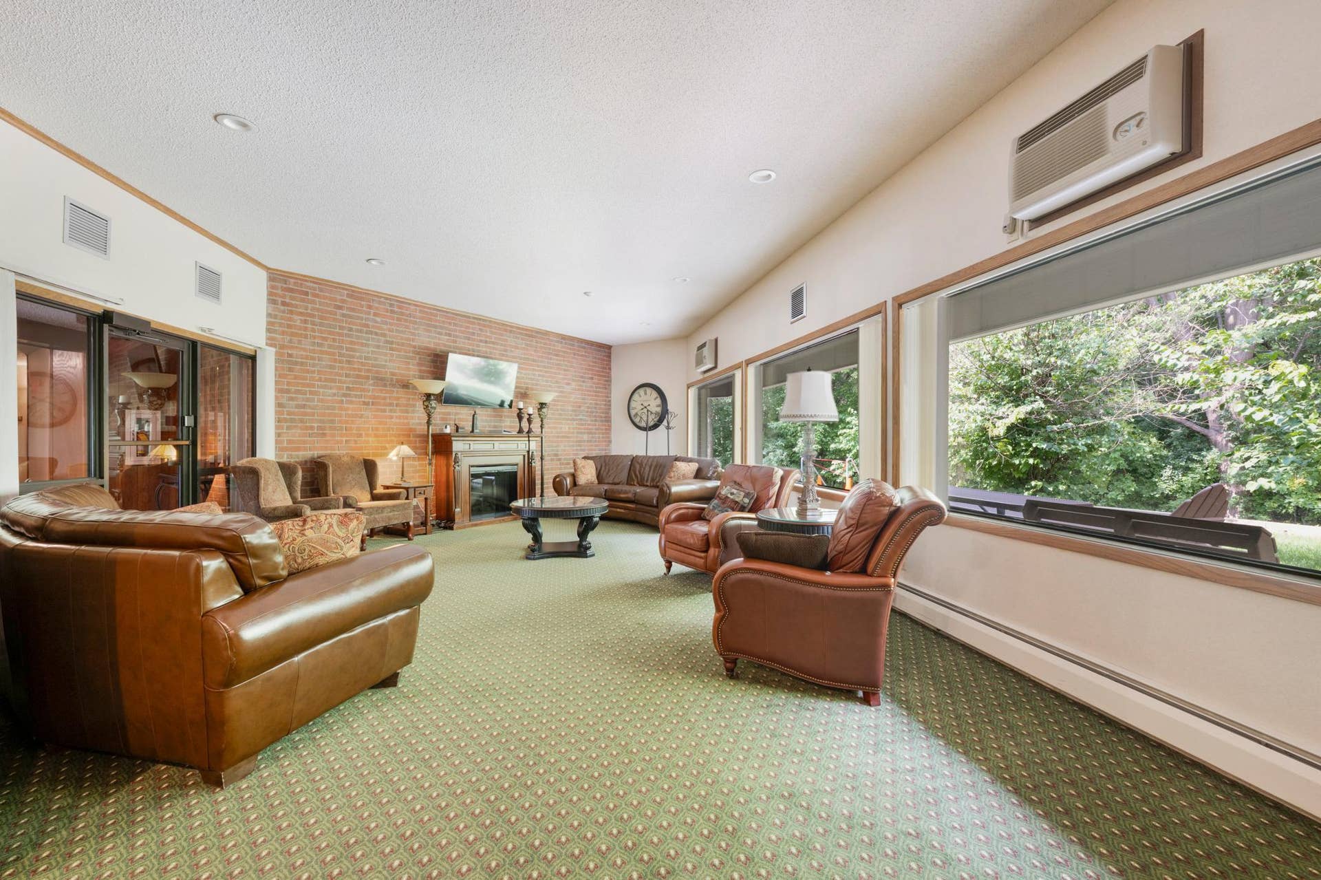 1800 Riverwood Drive, #301, Burnsville, MN 55337 Clubhouse-style party room is a wonderful place to meet neighbors and entertain guests.