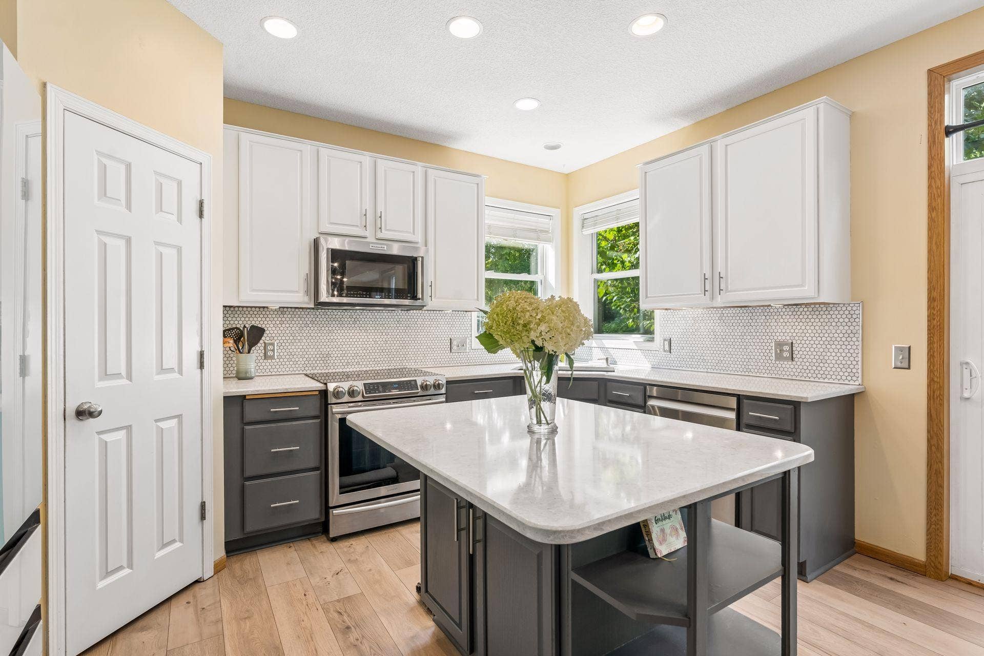16393 78th Avenue N, Maple Grove, MN 55311 Cambria Quartz countertops + Italian Marble backsplash