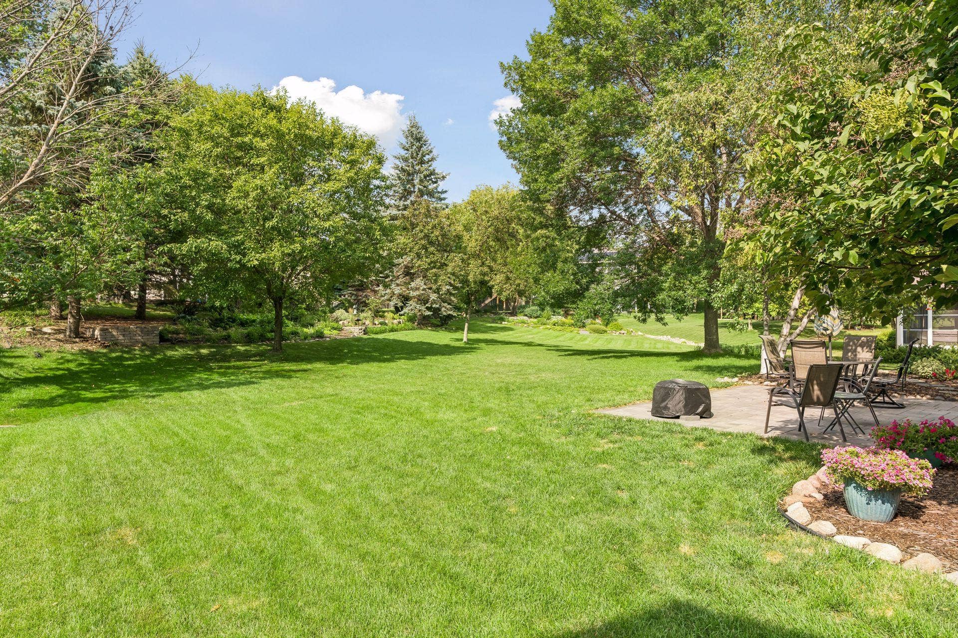 16393 78th Avenue N, Maple Grove, MN 55311 Many mature trees throughout The Crossings at Nottingham including in your own yard