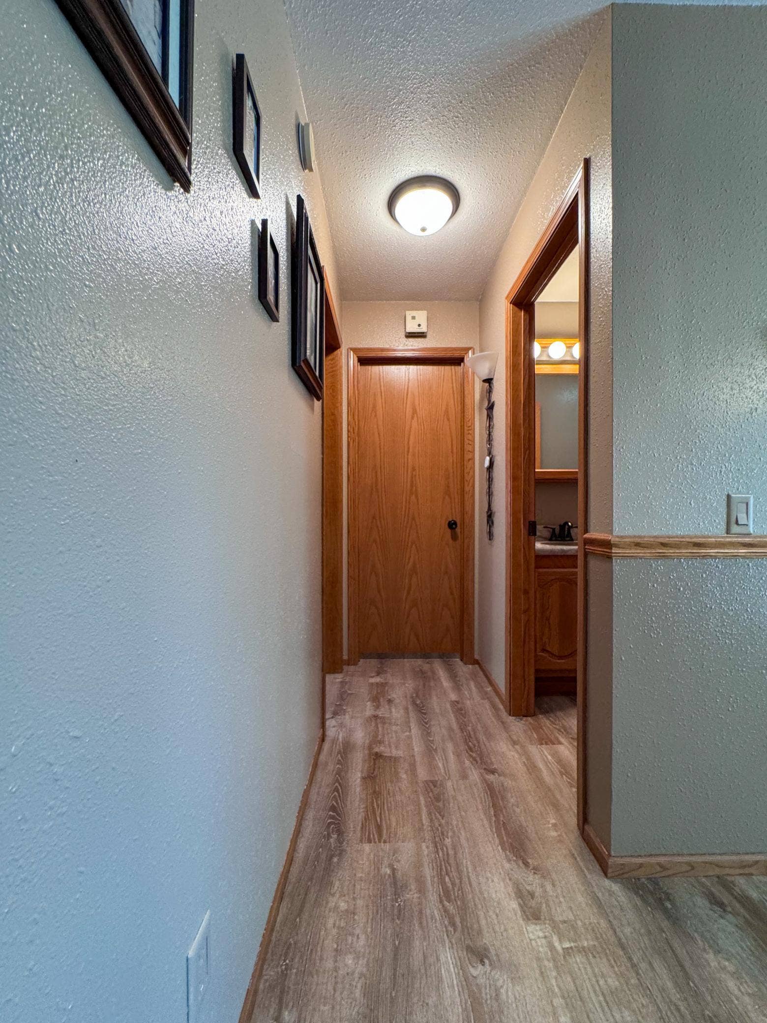 7775 Cardinal Road NW, Bemidji, MN 56601 hallway to spare bedrooms
