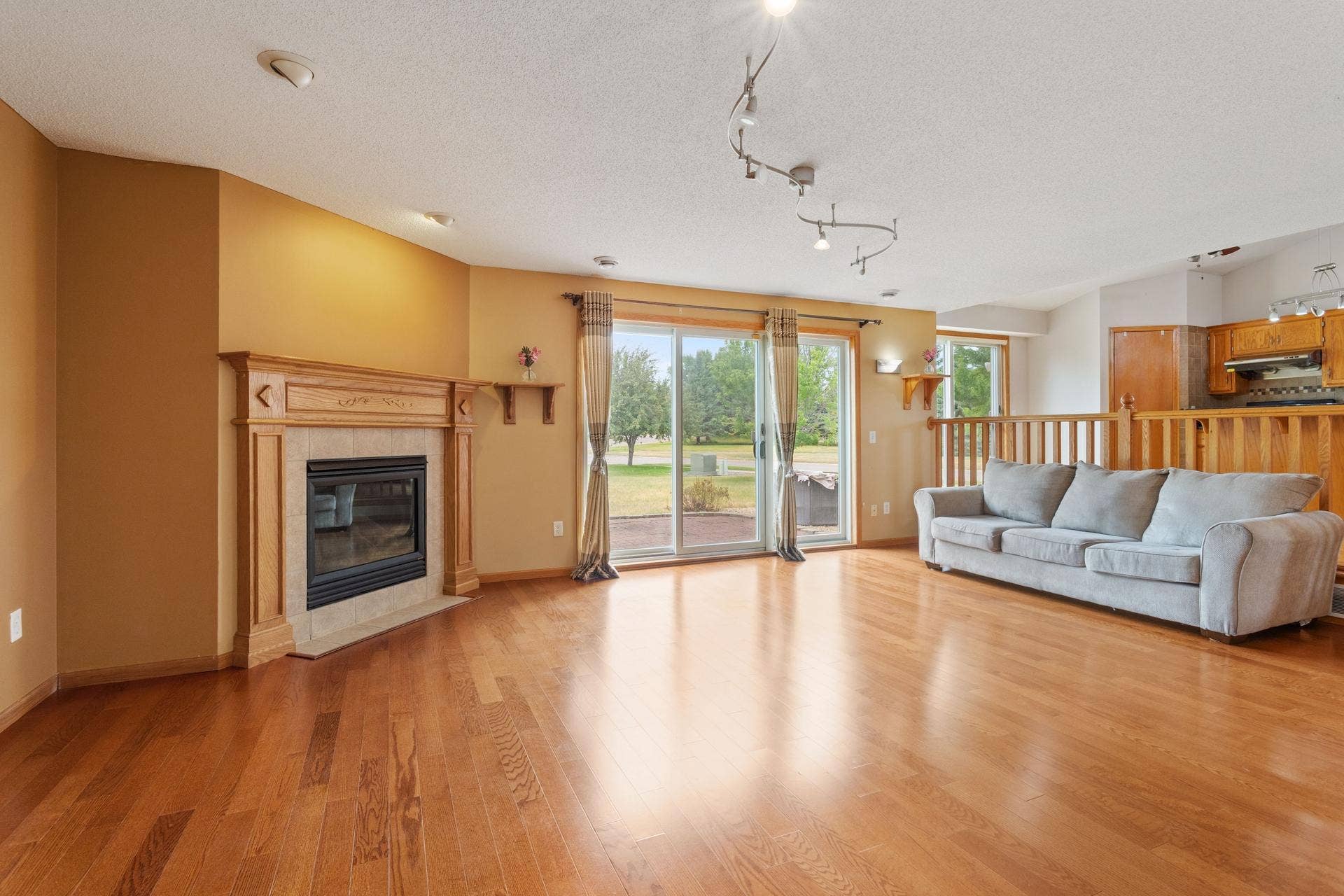 10049 Butternut Court N, Brooklyn Park, MN 55443 17 Main floor family room walks out to patio.jpg