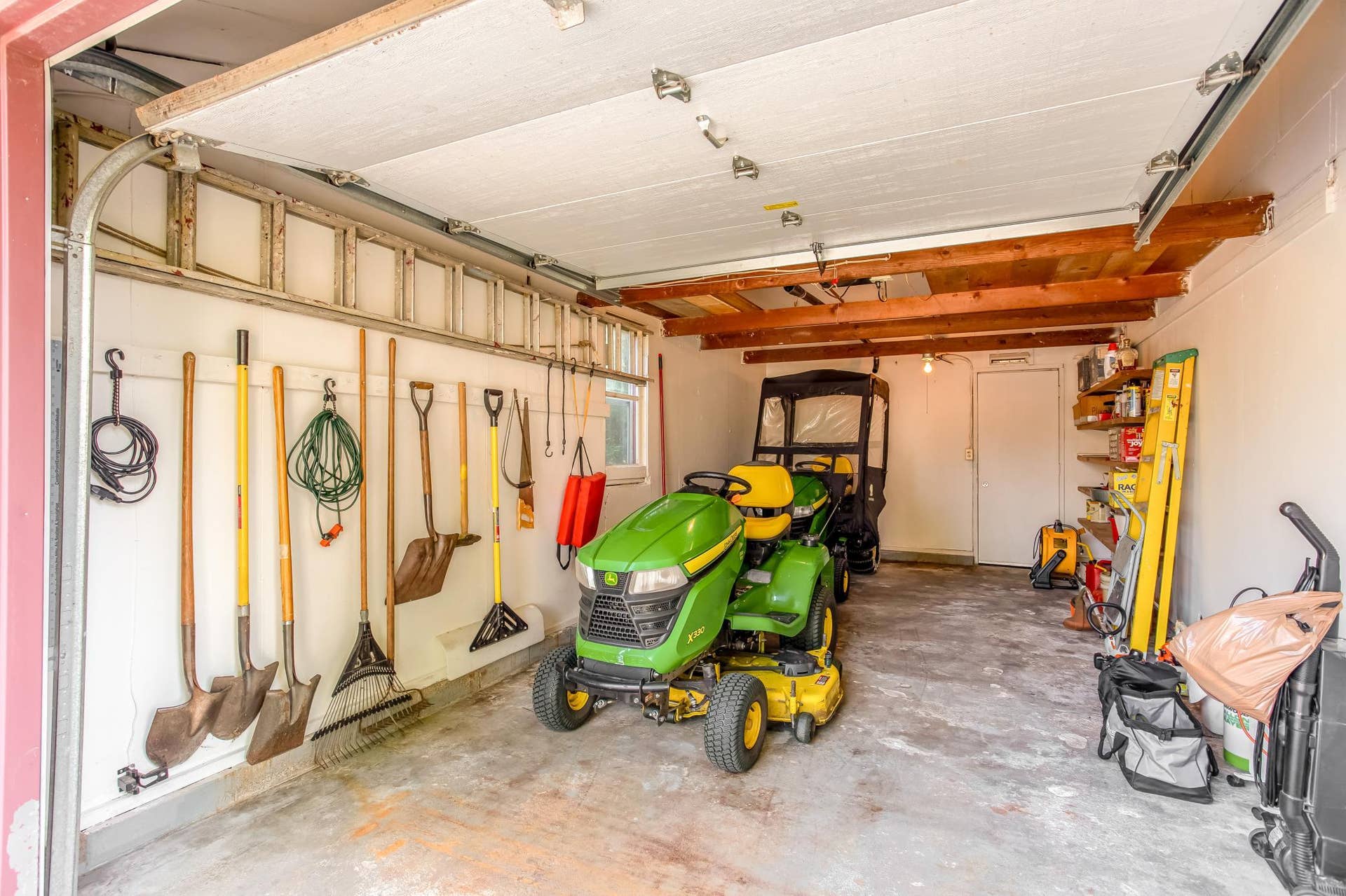Attached garage offers generous space for parking, storage, and household or outdoor equipment.
