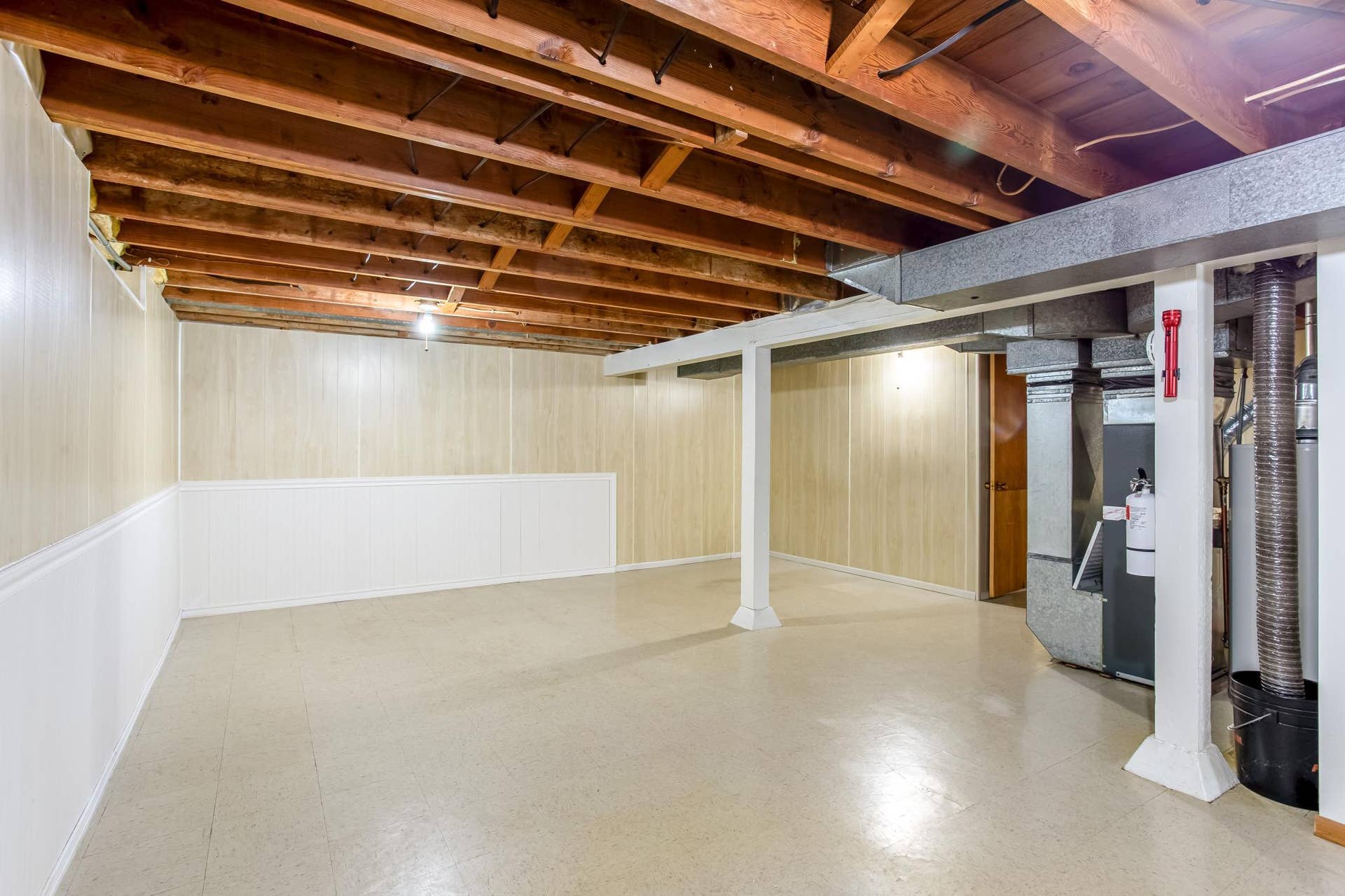 Generously sized lower-level space offers flexibility for recreation, hobbies, storage, or future customization.