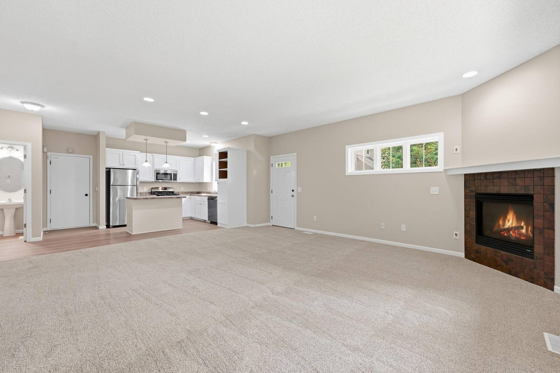3012 Cottage Lane N, Maplewood, MN 55109 3-web-or-mls-DSC03493_with_fire.jpg