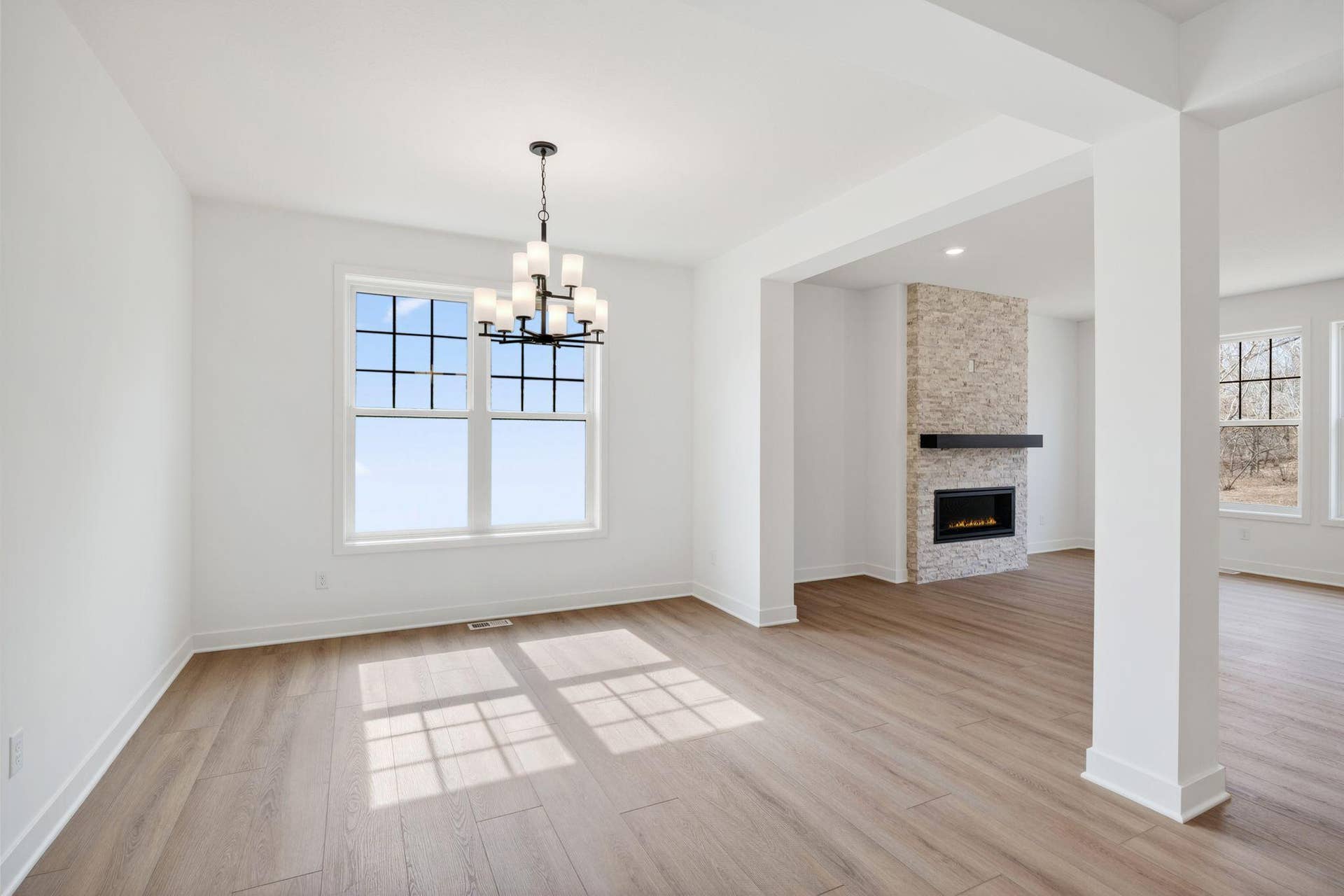 11180 Masters Street N, Lake Elmo, MN 55042 (Photo of a similar home, actual finishes may vary) Tucked conveniently between the Great Room and the office is a formal dining room, ideal for cozy meals with family and important occasions with friends.