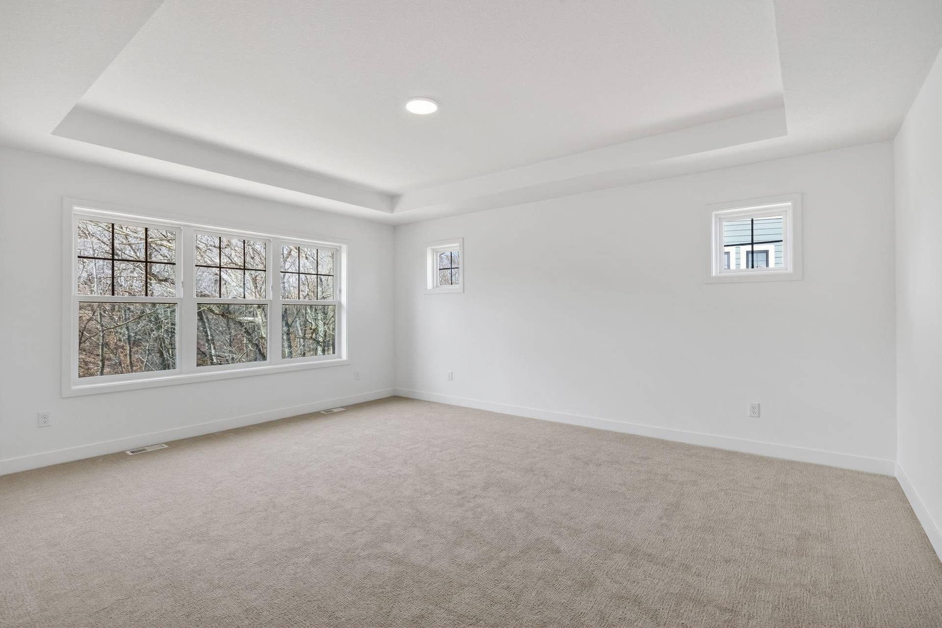 11180 Masters Street N, Lake Elmo, MN 55042 (Photo of a similar home, actual finishes may vary) Offering a private retreat made for rest and relaxation, the second-floor owners suite provides space for a seating area, a walk-in closet and a spa-inspired bathroom.