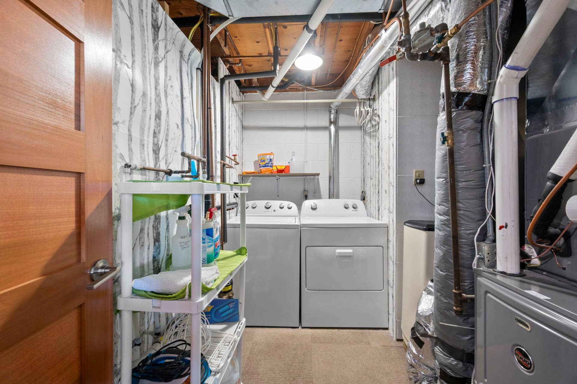 14333 91st Place N, Maple Grove, MN 55369 Dedicated laundry/utility room. Note the gorgeous 5-panel door on the left. These doors are throughout the house! Water heater is 2 years old; water softener stays with home.