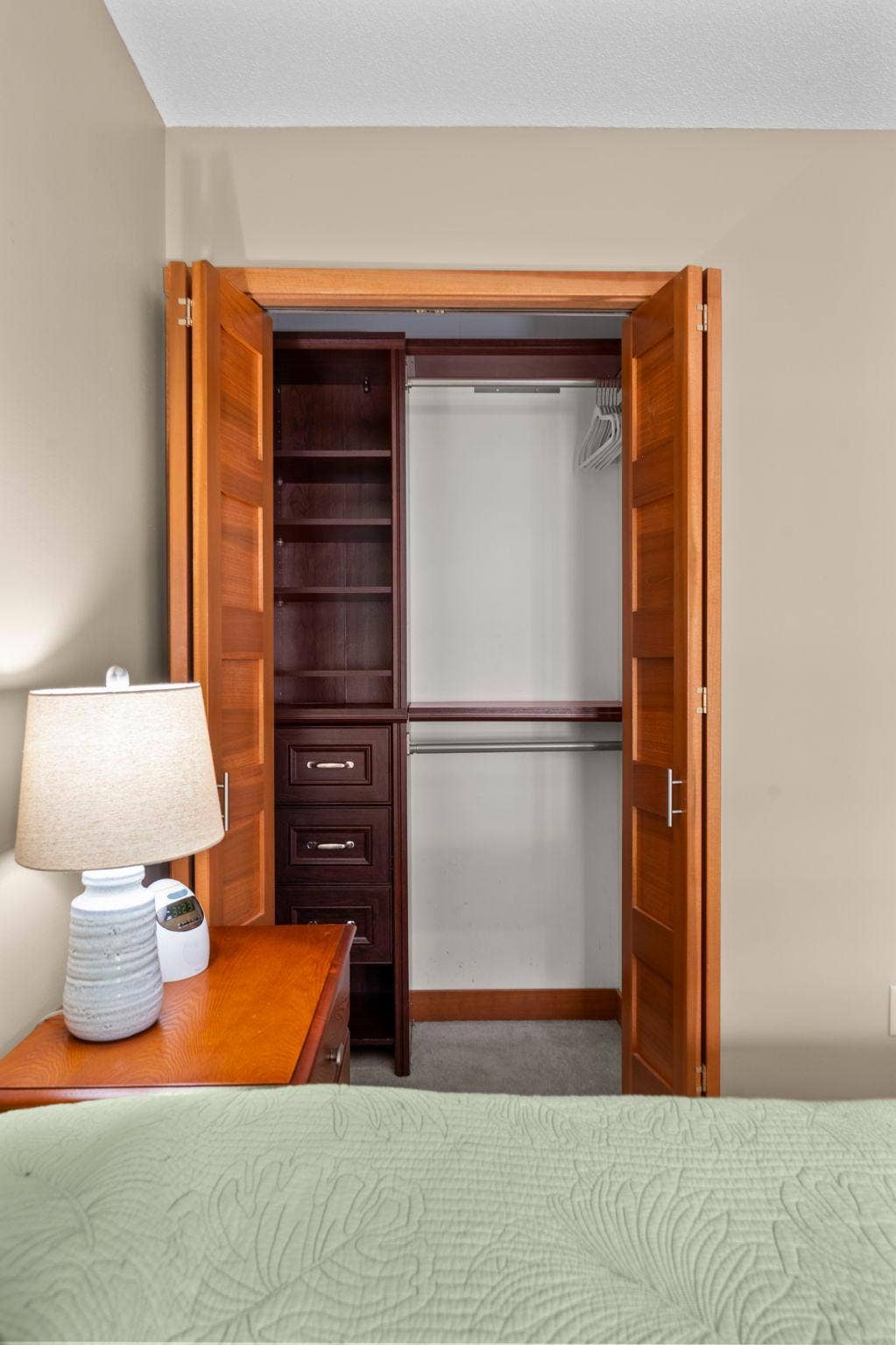 14333 91st Place N, Maple Grove, MN 55369 Beautiful 5-panel closet doors open to show off the cherry closet organizers.