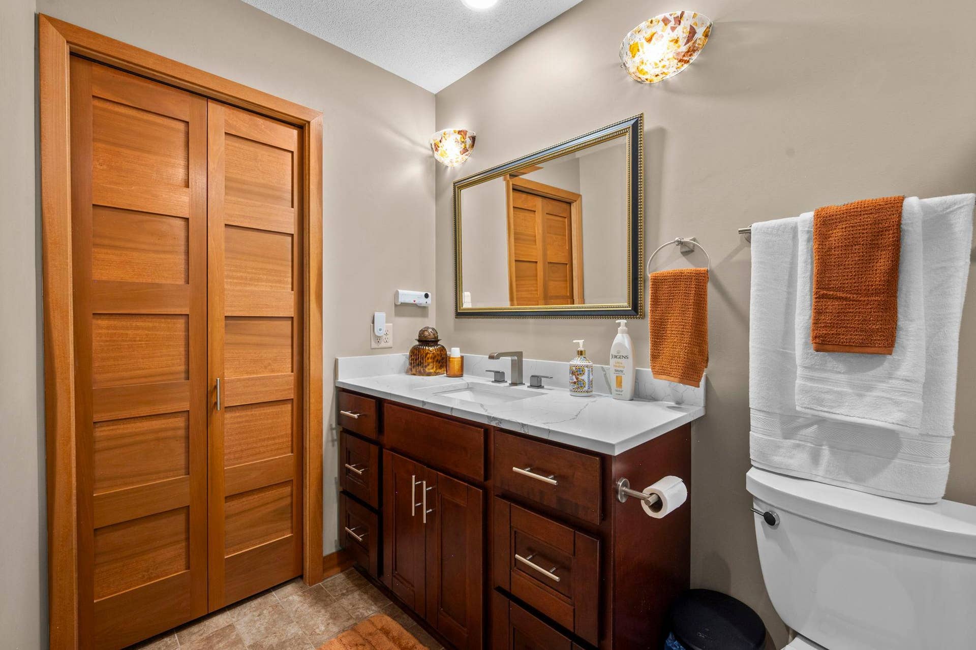 14333 91st Place N, Maple Grove, MN 55369 Upper level three-quarter bath. Bath was remodeled in 2018 with quality materials including porcelain tile floors and new lighting.