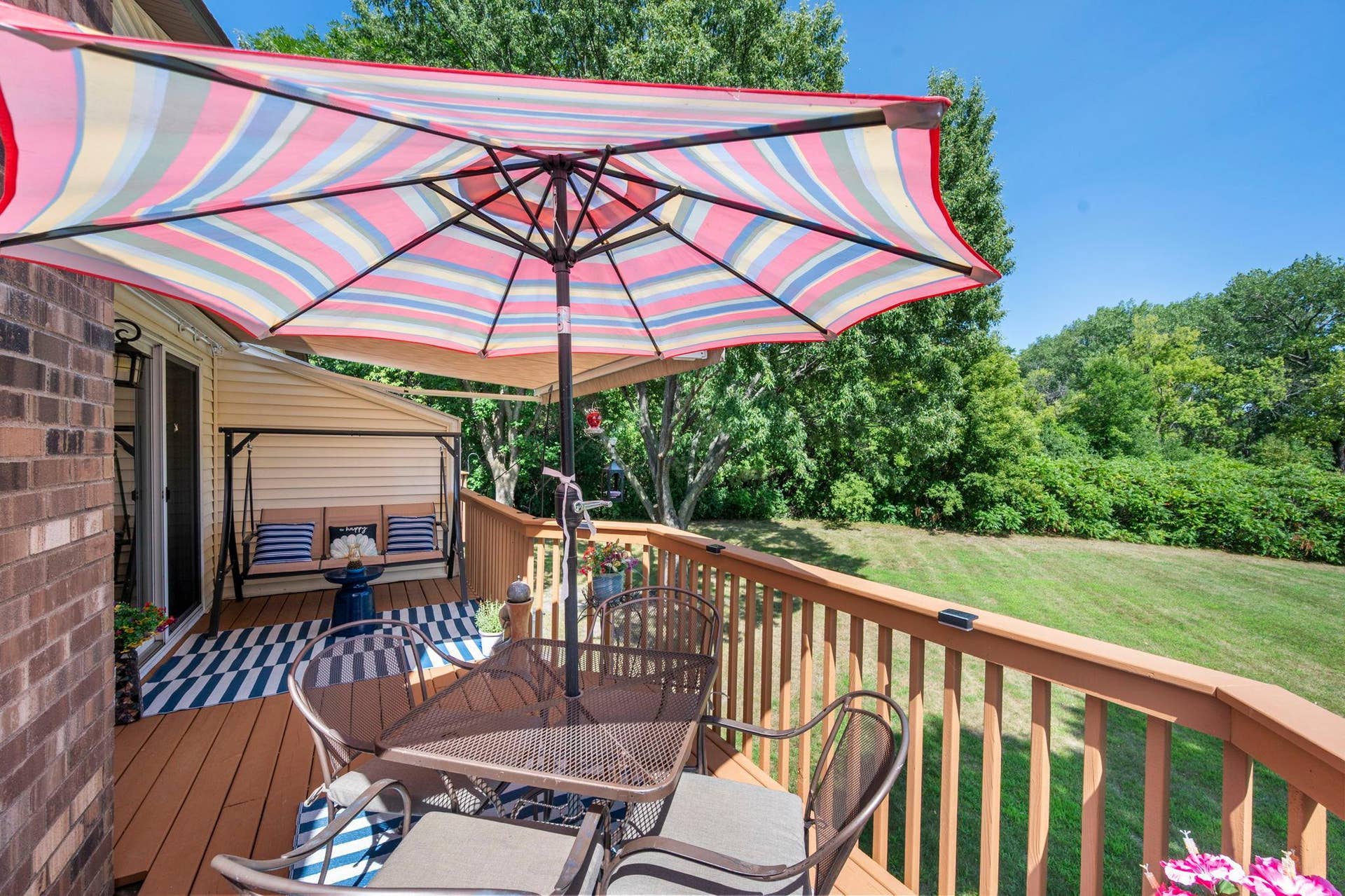 14333 91st Place N, Maple Grove, MN 55369 Enjoy lovely views from the large, well-maintained deck.