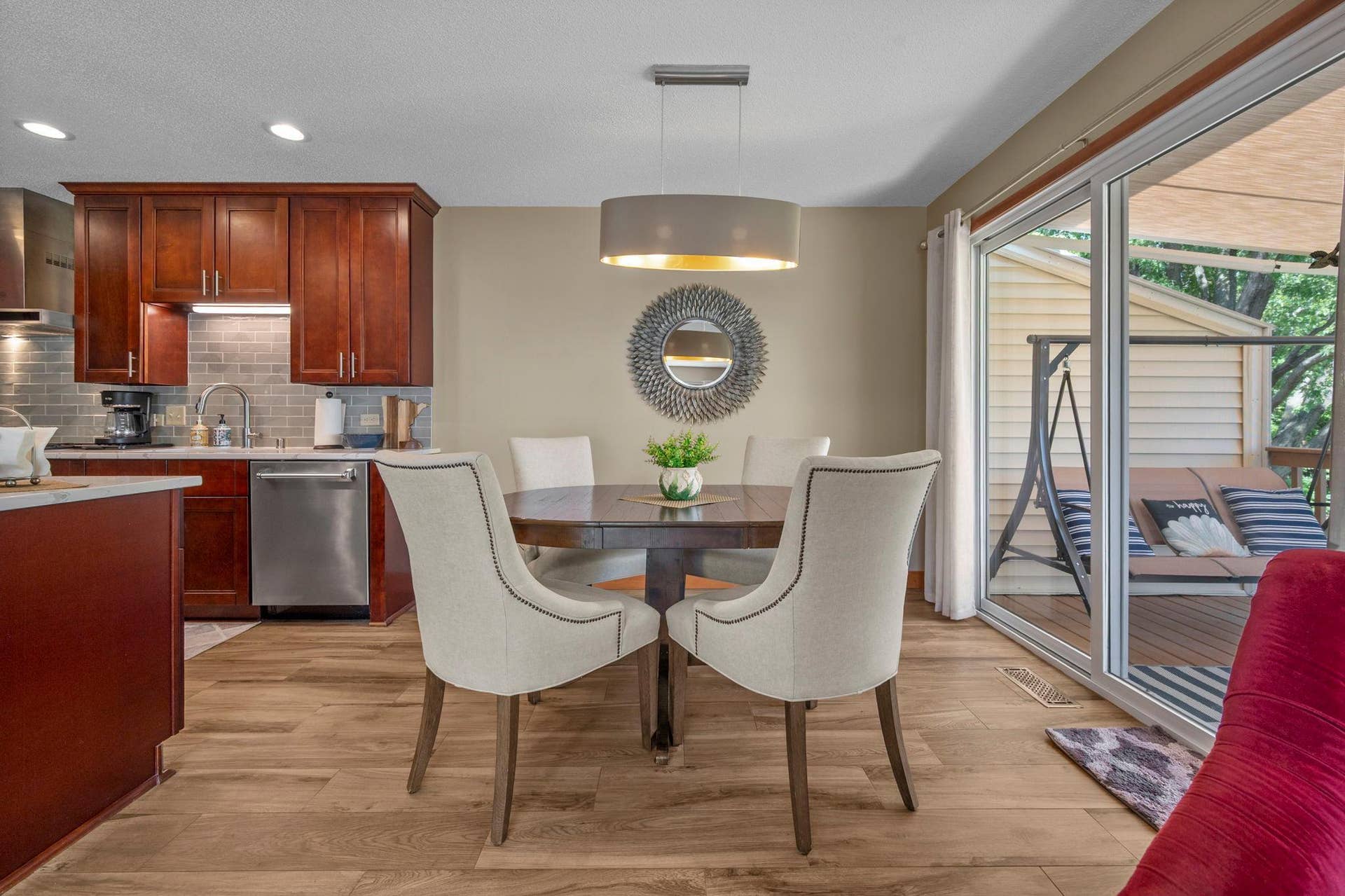 14333 91st Place N, Maple Grove, MN 55369 The quality is evident, from the remodeled kitchen with cherry cabinets to the porcelain tile floors and stunning light fixture.
