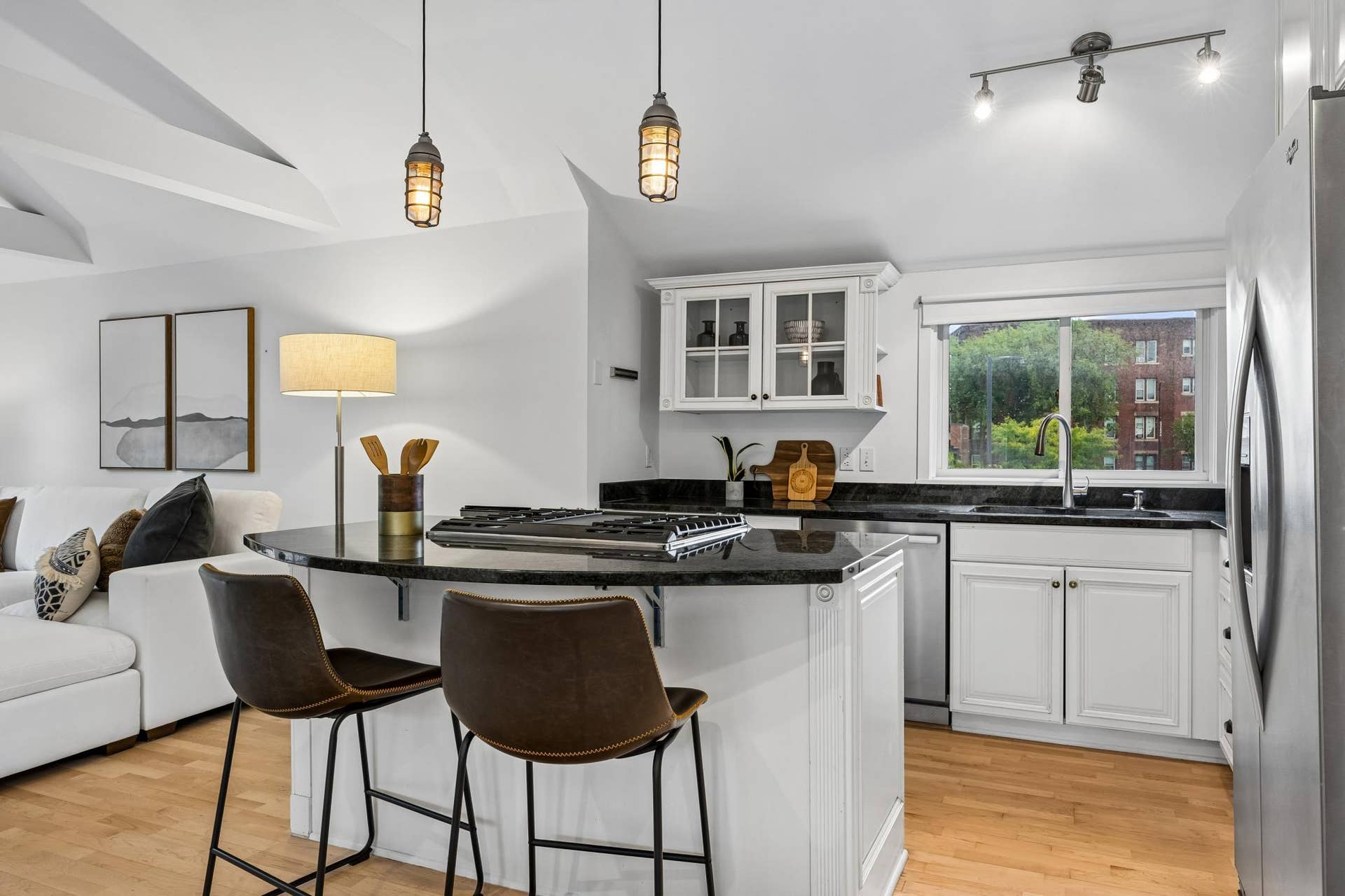 2637 1/2 Humboldt Avenue S, 21, Minneapolis, MN 55408 Updated kitchen with a center island serving a breakfast bar, offering a functional space for cooking, dining, and gathering