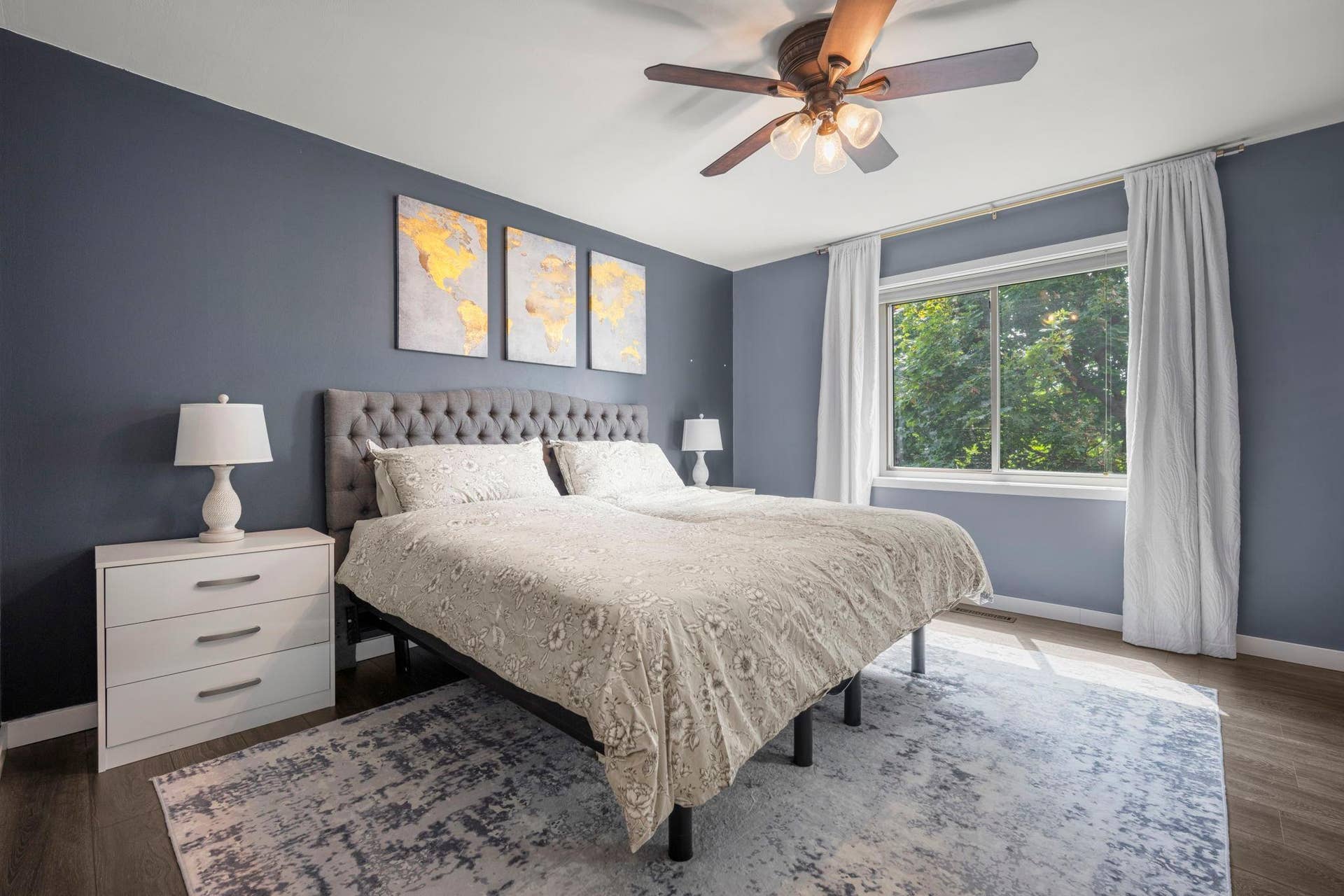 Spacious primary features LVP floors and large windows.