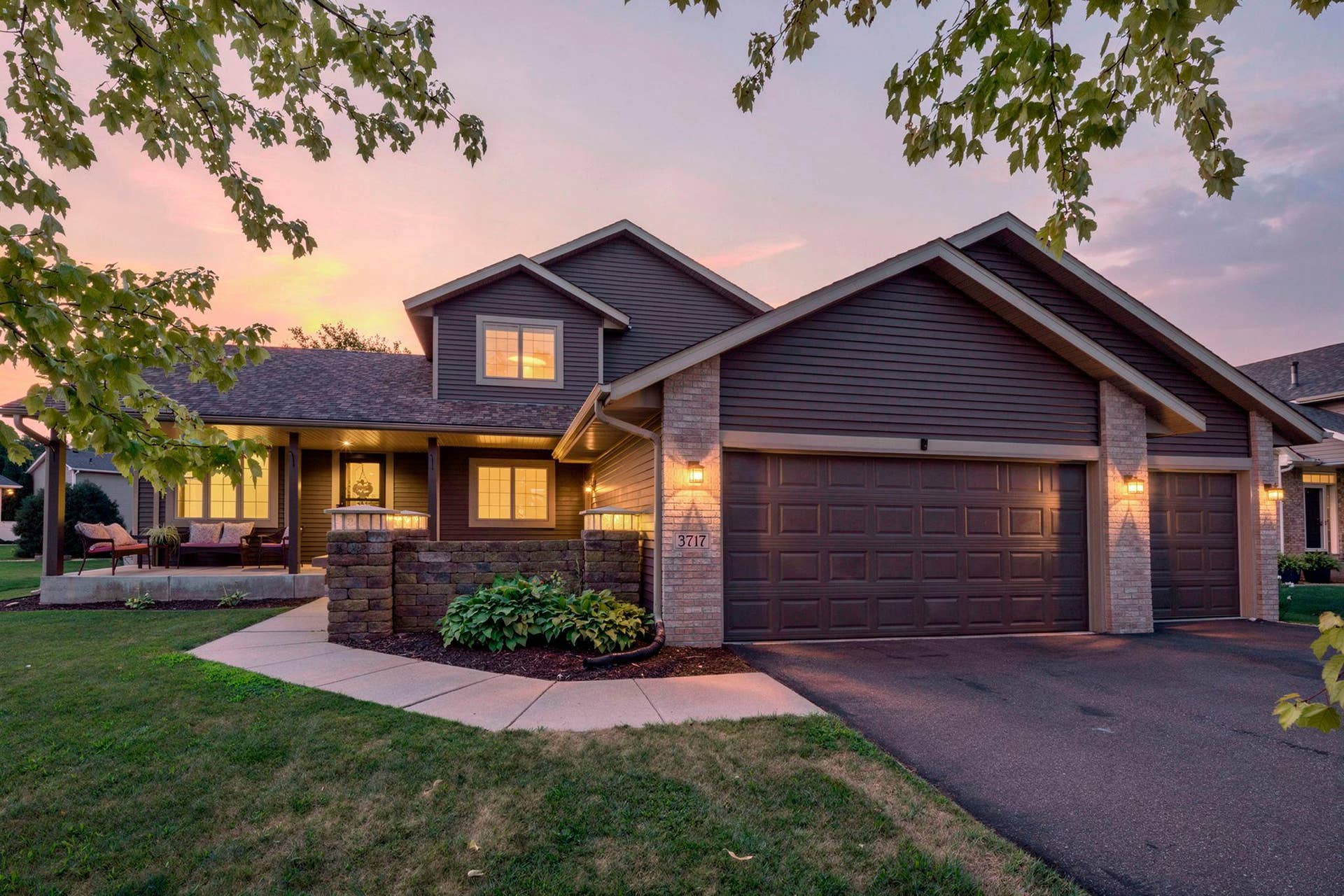 Wow! Stunning home from the moment you drive up! Welcoming porch and front patio section is a standout.