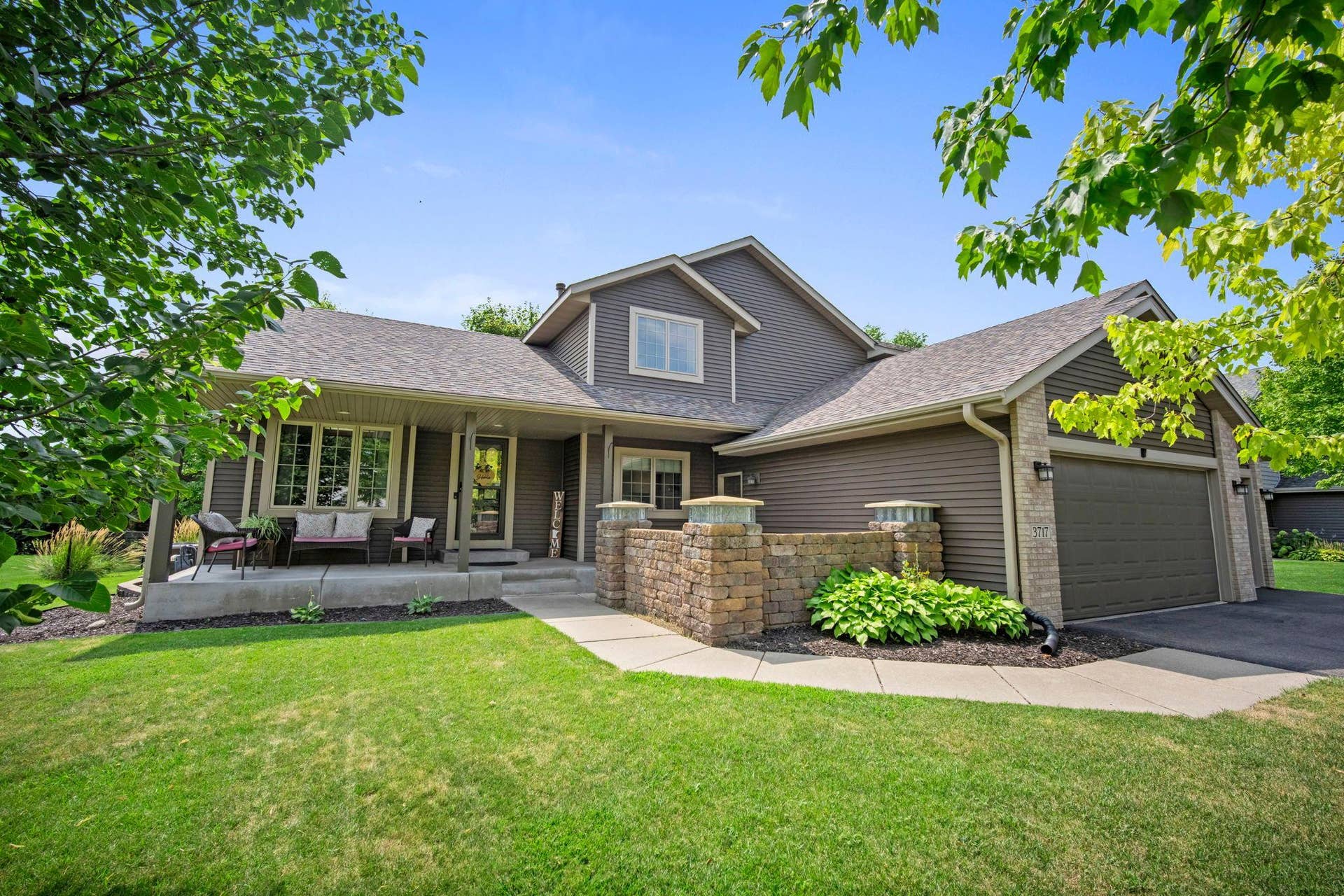 Welcome home to this fabulous Brooklyn Park home near Edinborough. You'll love the front porch and stone patio area.