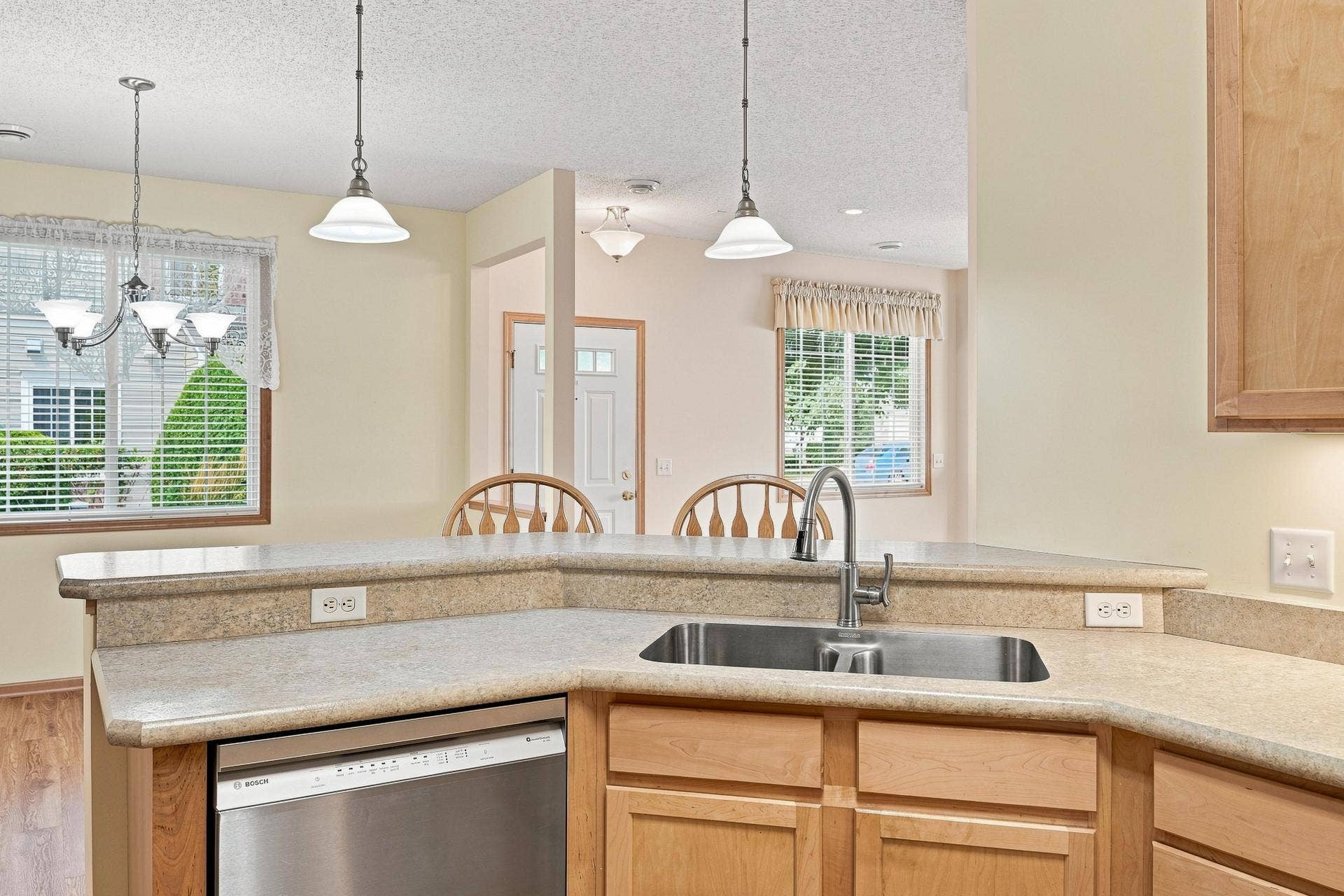 11021 Oak Grove Circle #C, Woodbury, MN 55129 Maple Cabinets, Bosch Dishwasher (2025) & Pendant Lighting