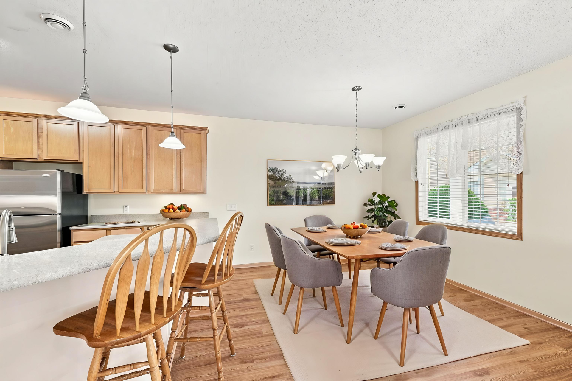 11021 Oak Grove Circle #C, Woodbury, MN 55129 This Photo is Virtually Staged - Dining Area