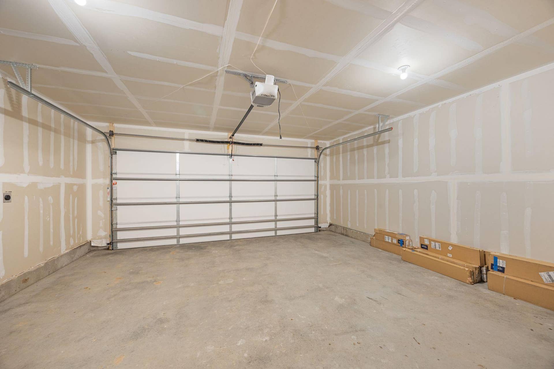 1339 Howard Street N, #1, 92, Saint Paul, MN 55119 2 car attached garage! Plug-in for electric car on the wall to the left