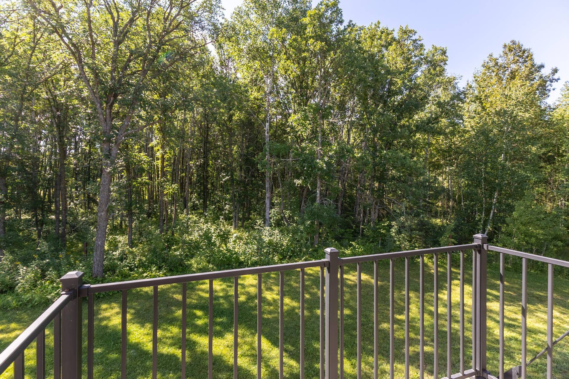 7639 Emerald Pines Drive NW, Bemidji, MN 56601 Primary bedroom deck-60.jpg